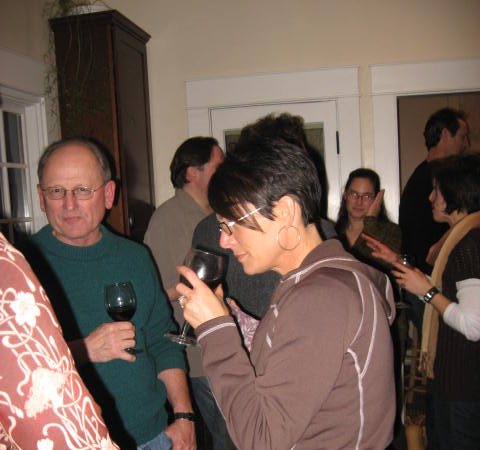 Party attendees sampling the wine.