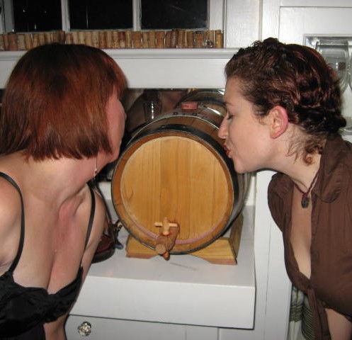 Two lovely ladies giving the wine barrel a kiss goodbye!