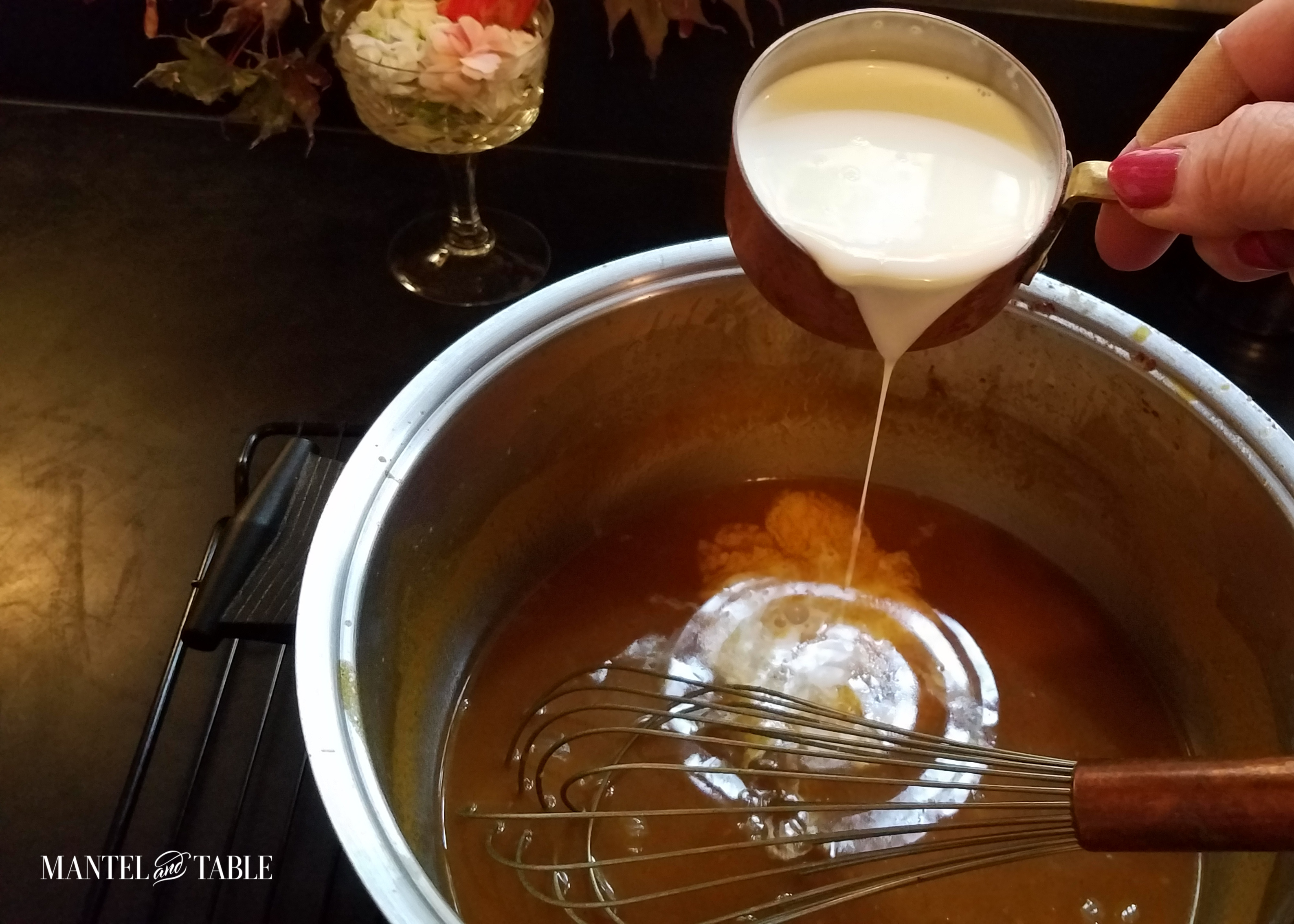 Adding cream to the pot