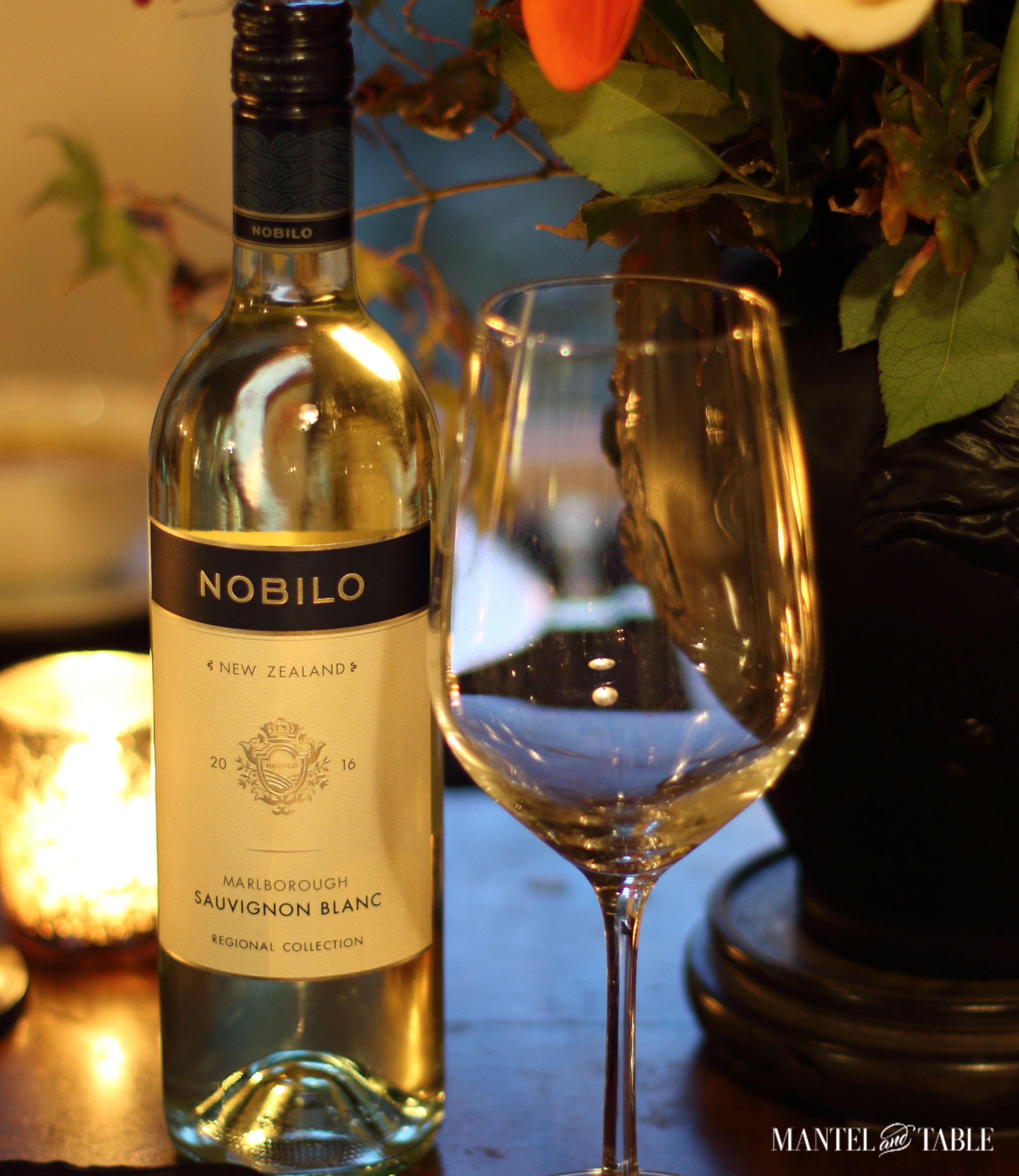 Nobilo wine bottle and clear wine glass