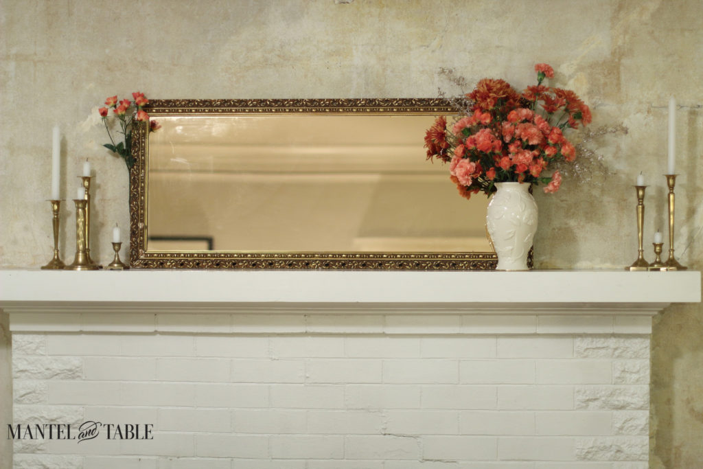 white mantel peach flowers