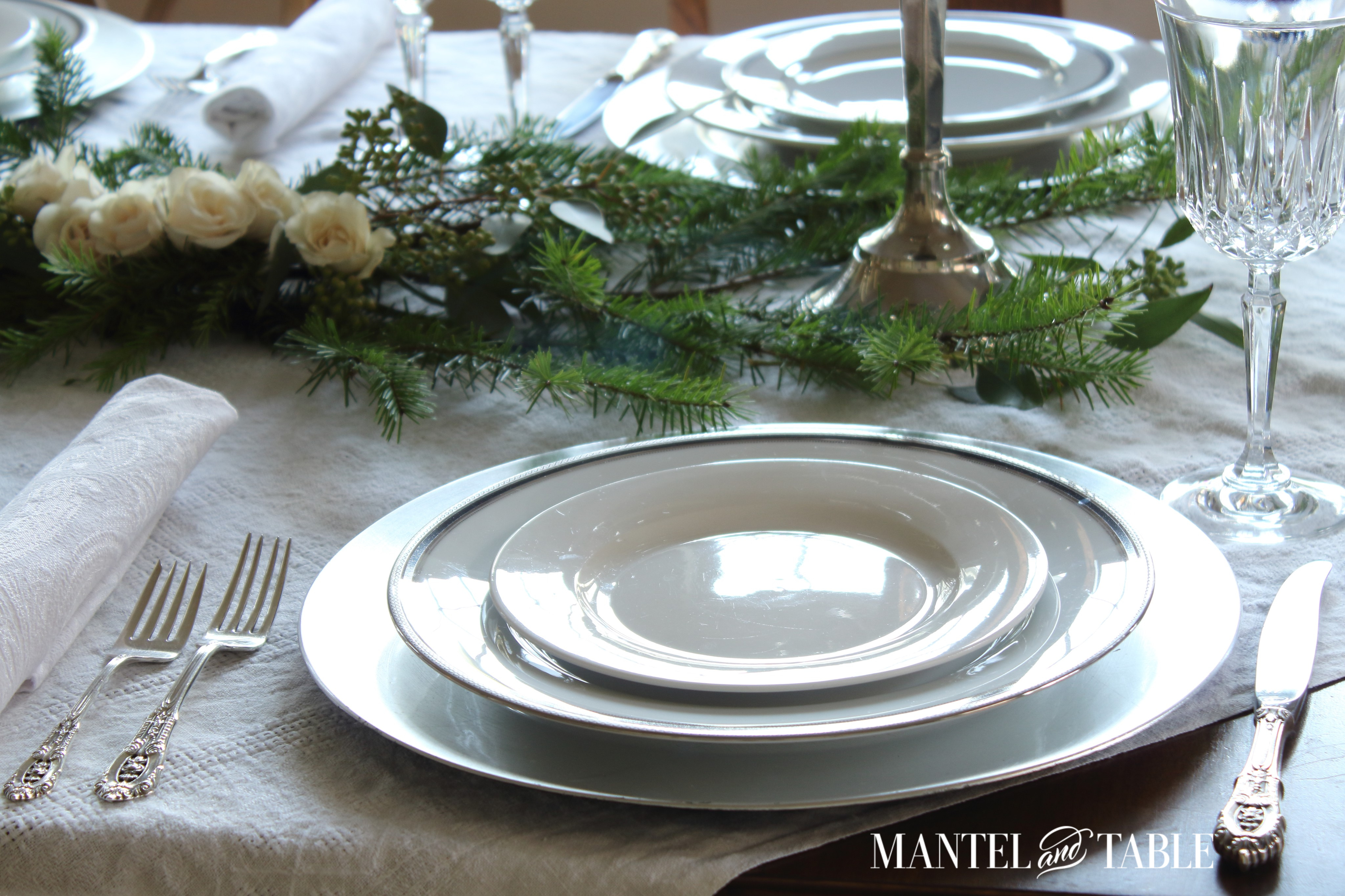 Silveer flatware on White table
