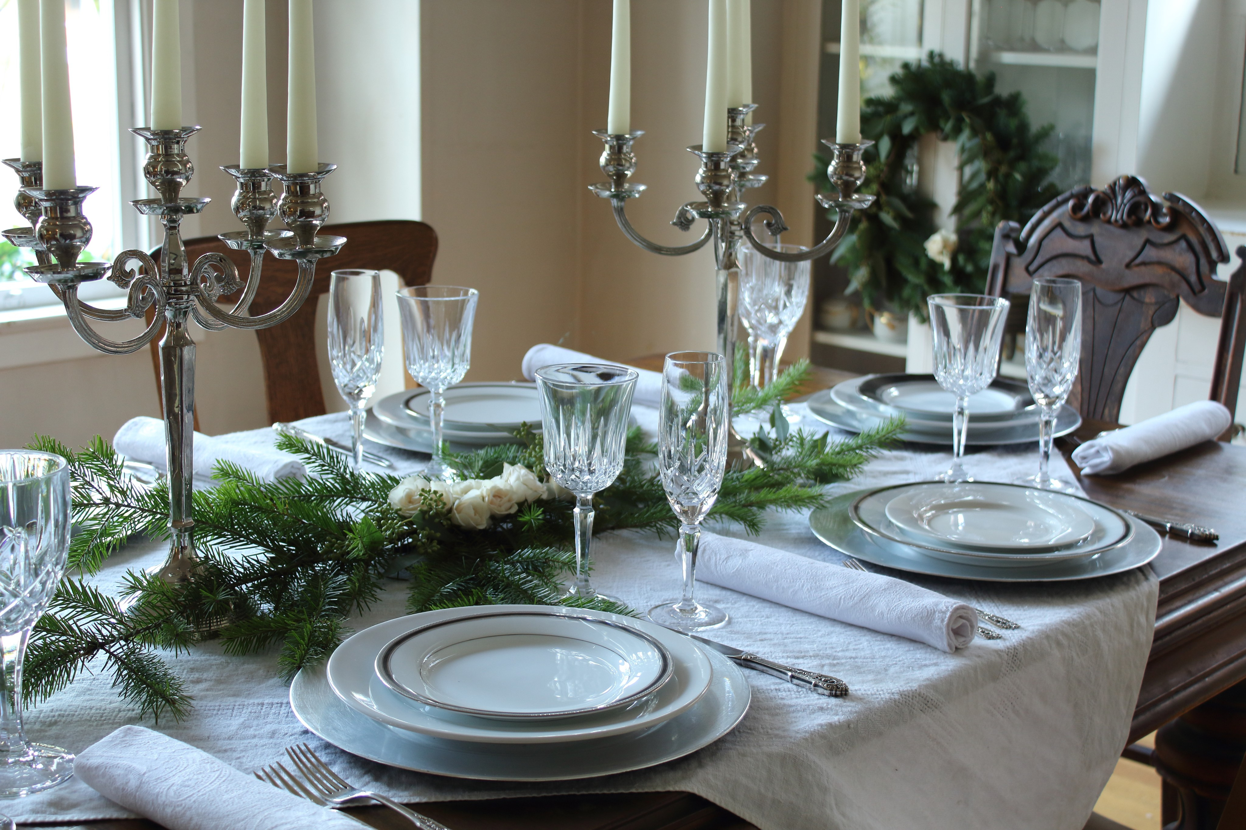 White Holiday Table with evergreens