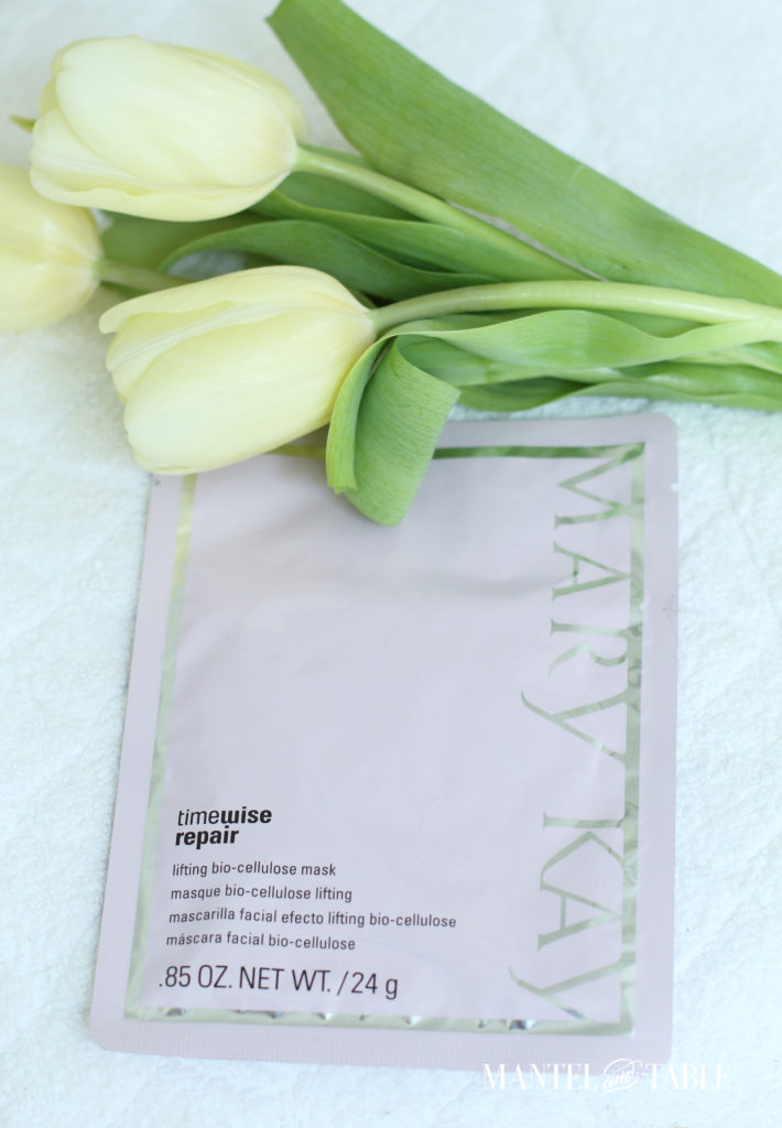 Spa Day ~ Pink facial mask packet with yellow tulips on white towel