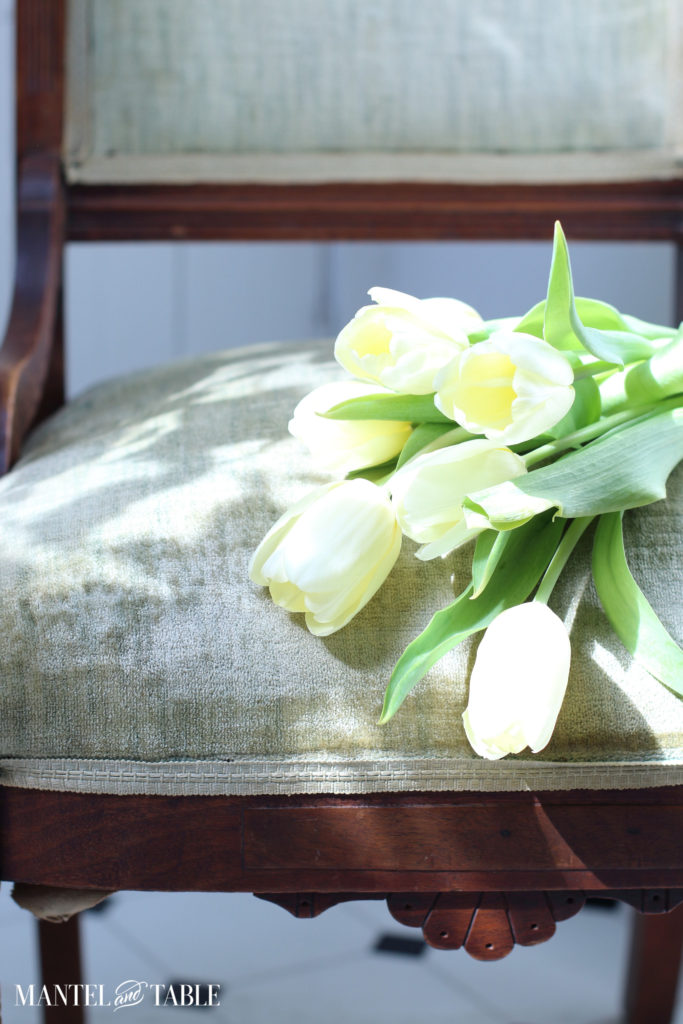 Green chair with Yellow tulips