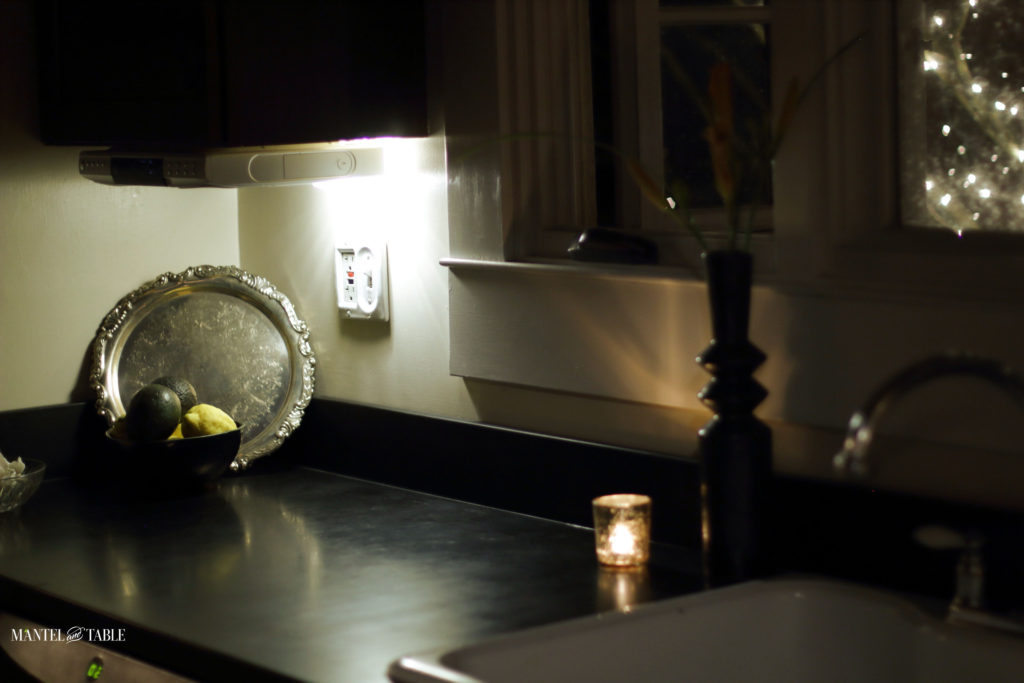 Cozy evening kitchen - clean counters, candlelight