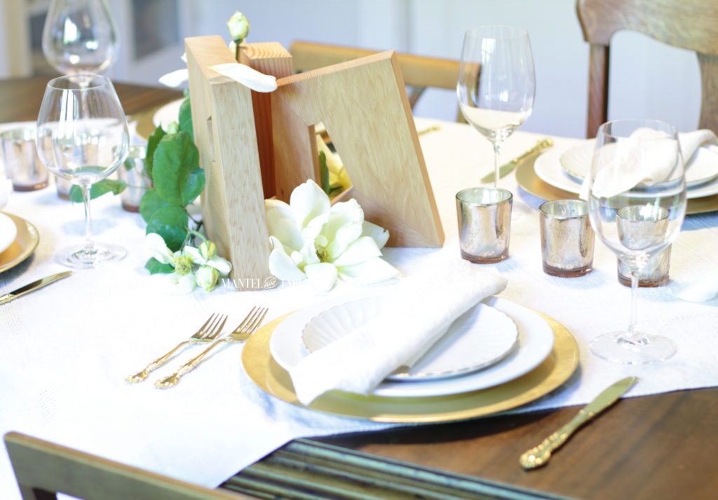 Closeup of 4 place settings and centerpiece