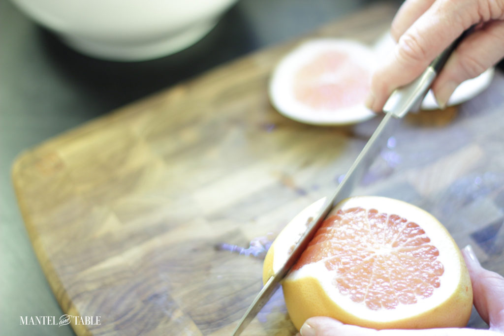 Cutting the sides off the grapefruit
