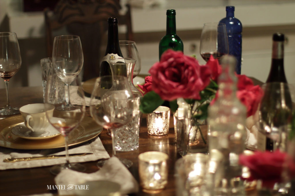 Table setting after a dinner party - lots of empty glasses!