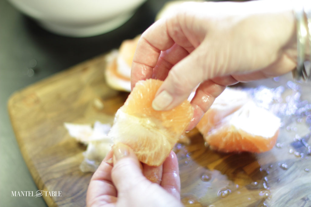 Supreming the grapefruit by hand for grapefruit avocado salad