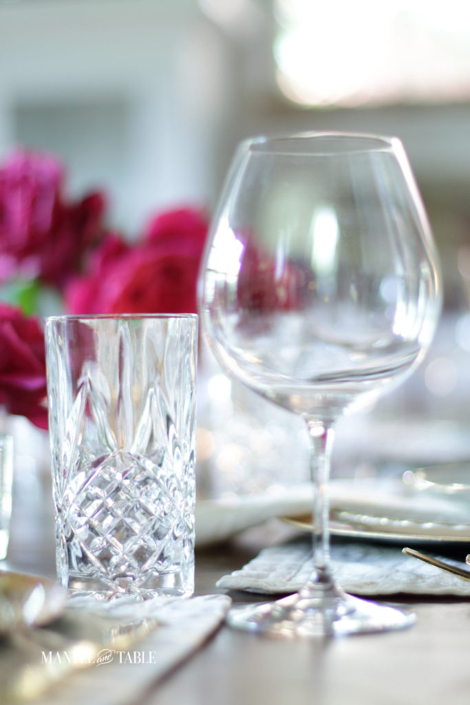 Closeup of crystal wine glass and cut crystal water glass