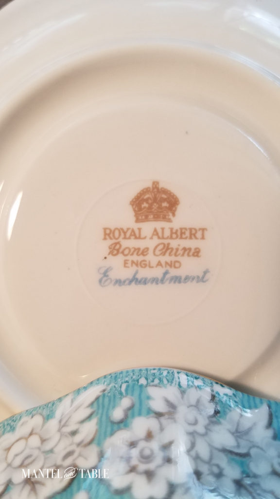 Underside of saucer - "Royal Albert Bone China England Enchantment" marking below a crown.