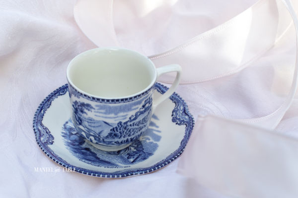 Johnson Brothers blue cup sitting on saucer