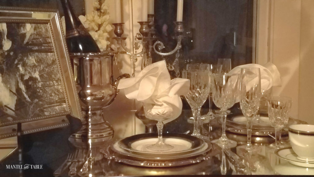 Tablescape with champagne bucket and crystal