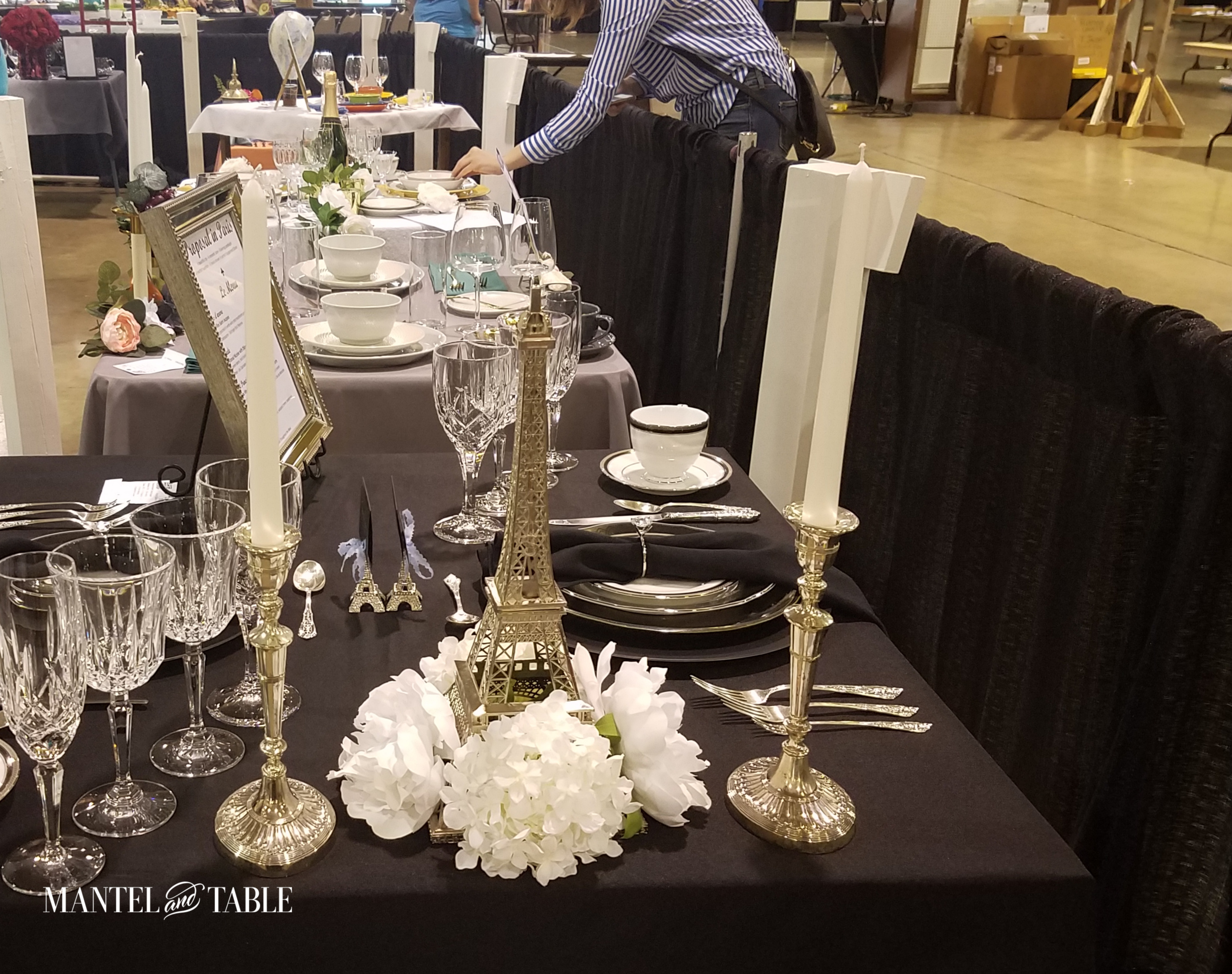 Engagement Dinner Table Setting from the side looking down the row of other tables