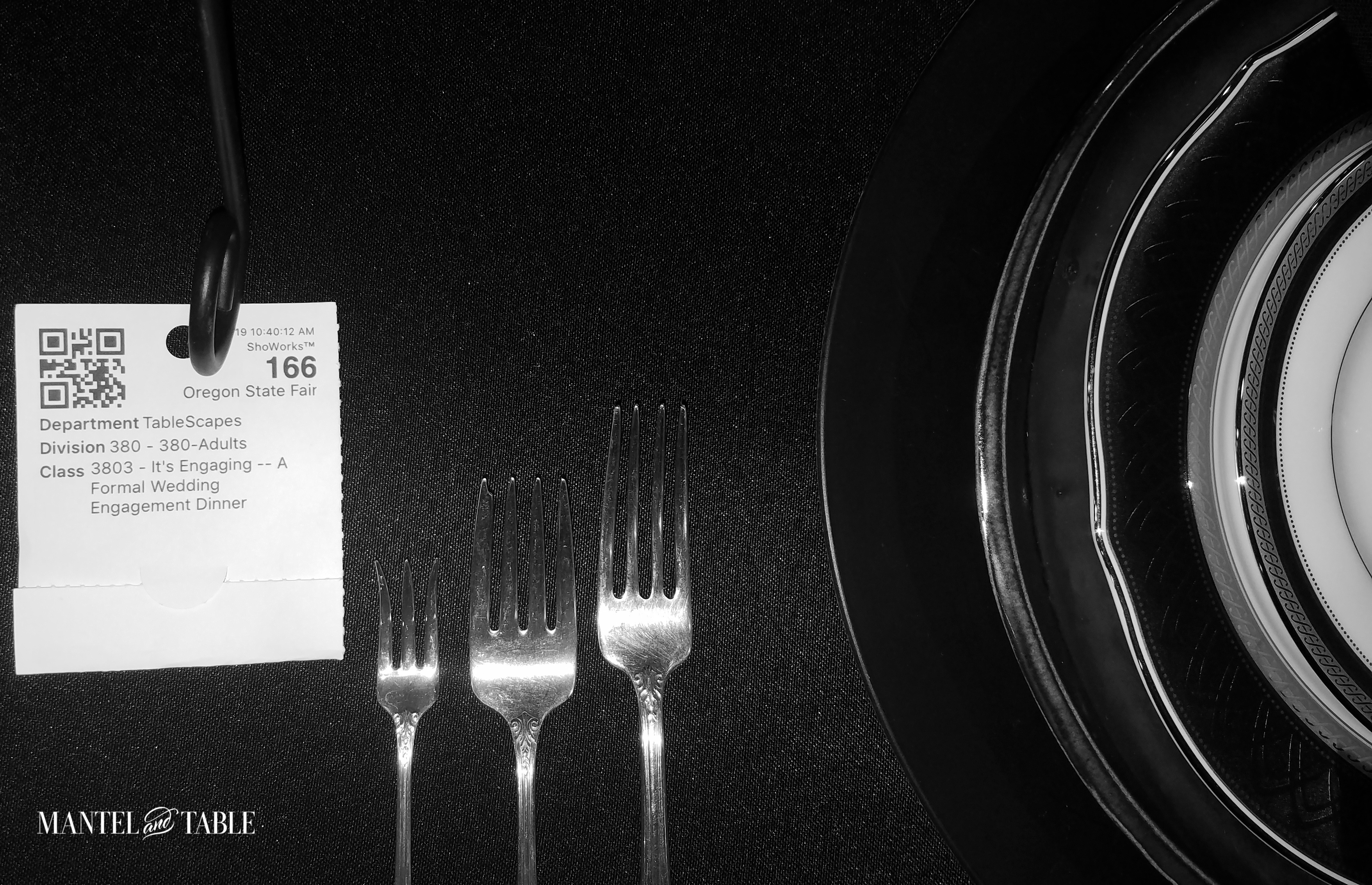 Engagement Dinner Table Setting plate stack & forks with entry card