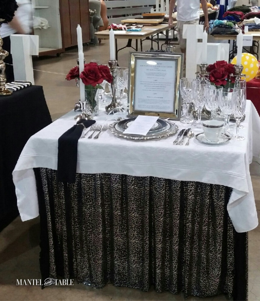 White, silver & black tablescape competition entry with silver leopard print table skirt