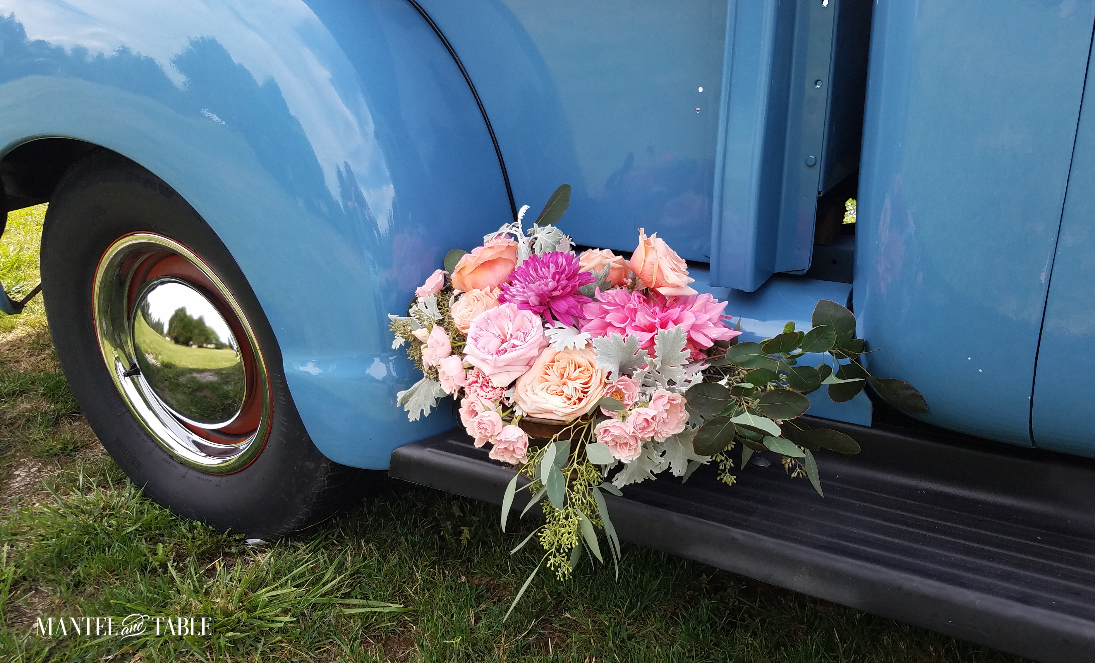 flower arrangement on a truck's running board
