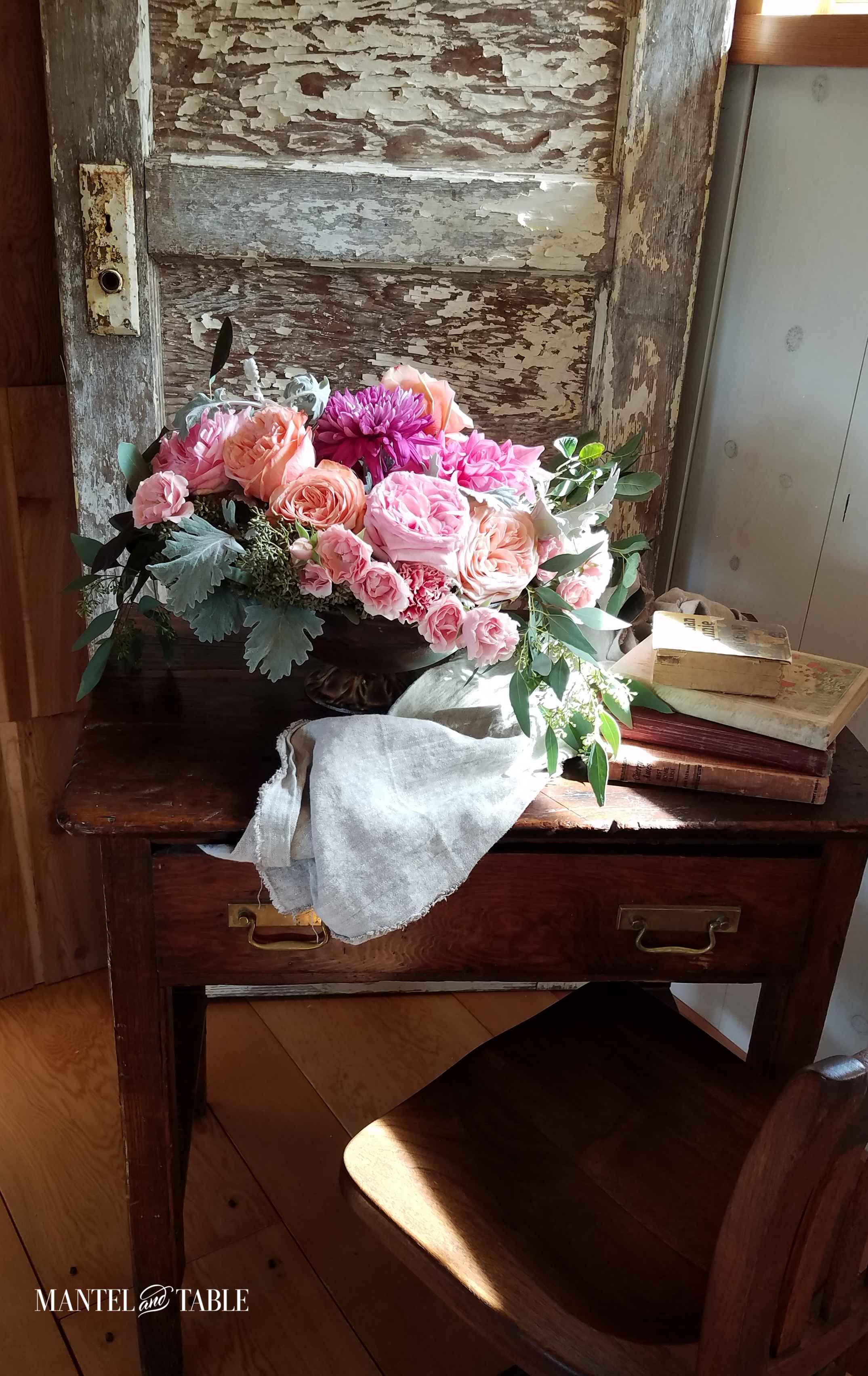 Flower arrangement on a desk at the Petals & Props workshop