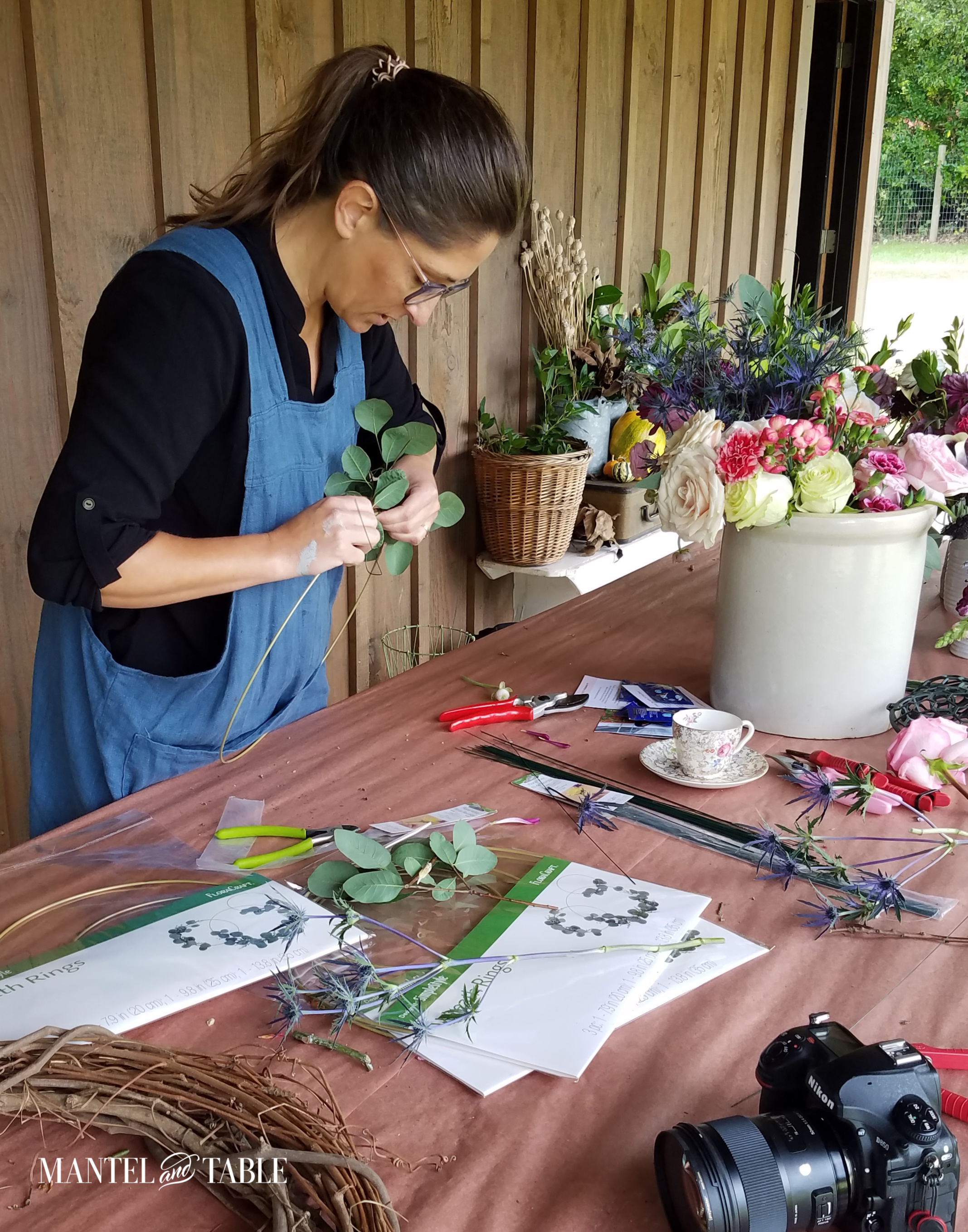 Rhonda Hallstrom making a wreath at Petals & Props workshop
