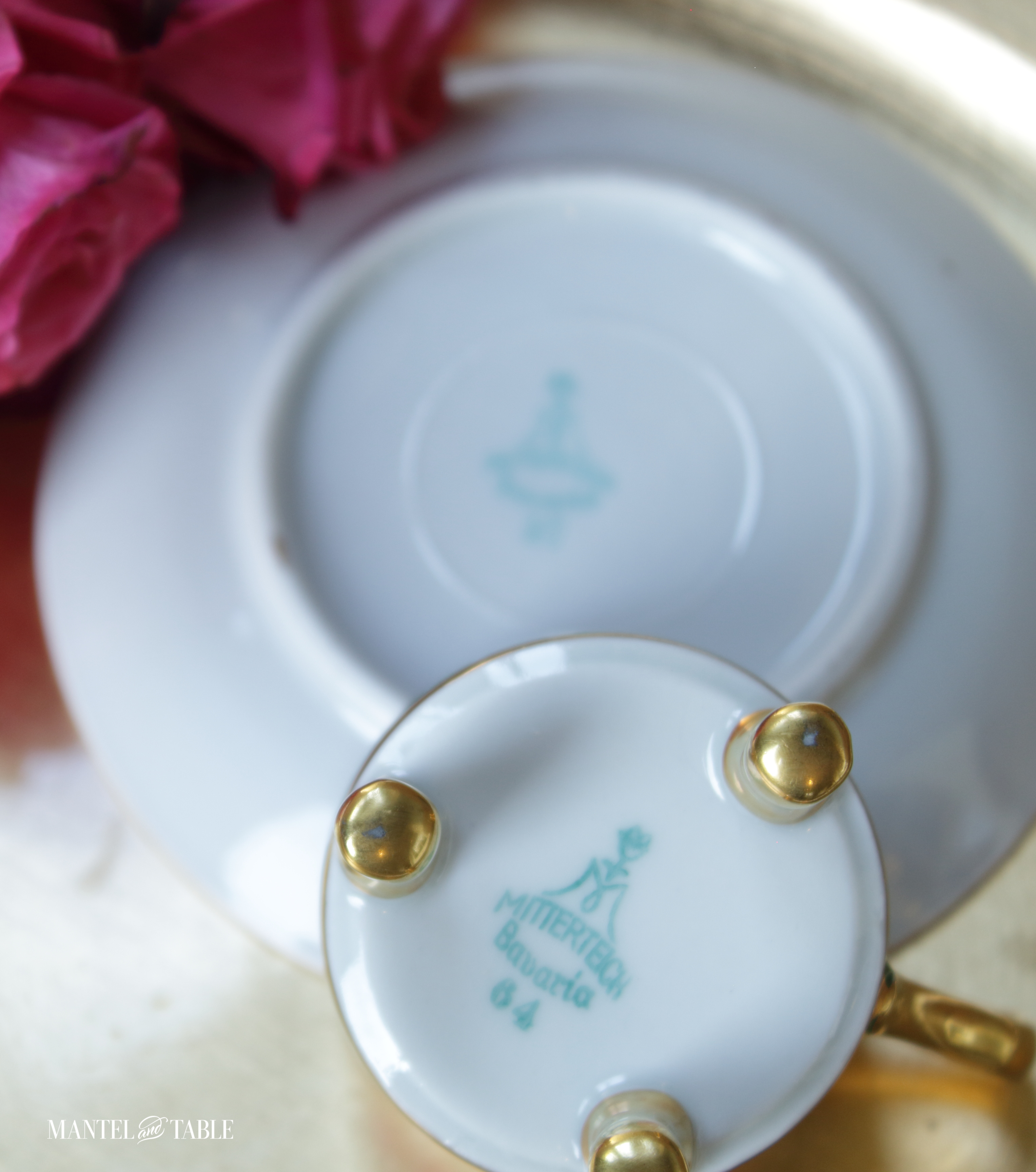 Undersides of both cup and saucer, showing backstamp marks