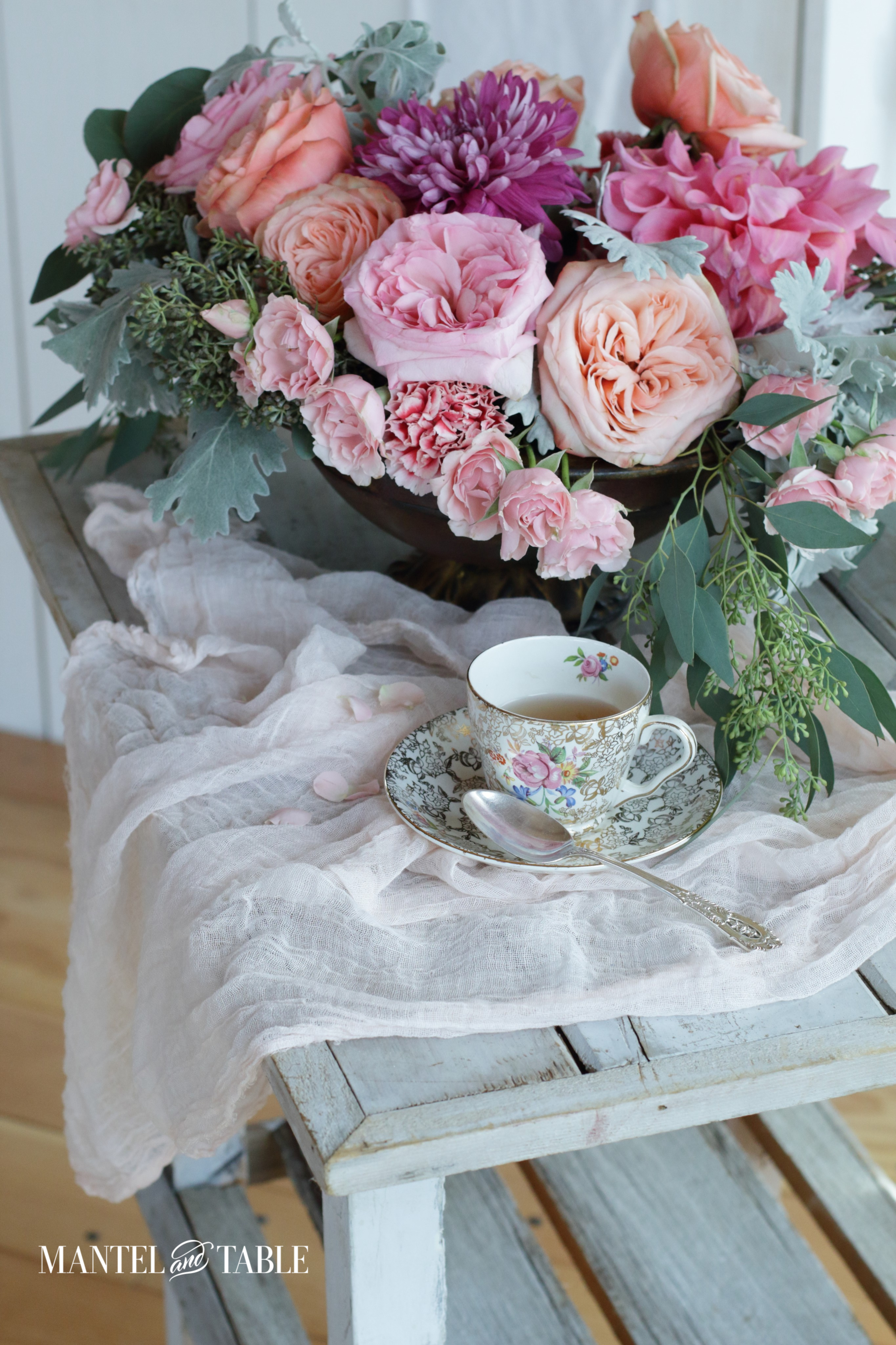 teacup and flower arrangement