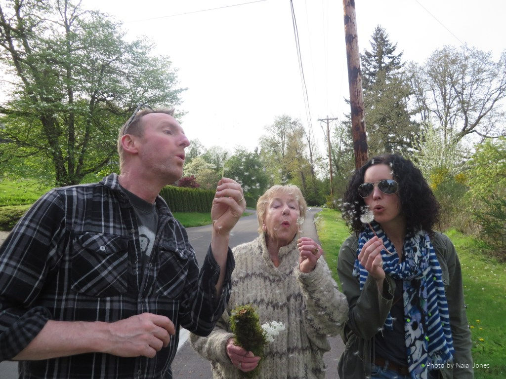 Life Lessons - my brother, mom, & sister in law blowing dandilion seeds