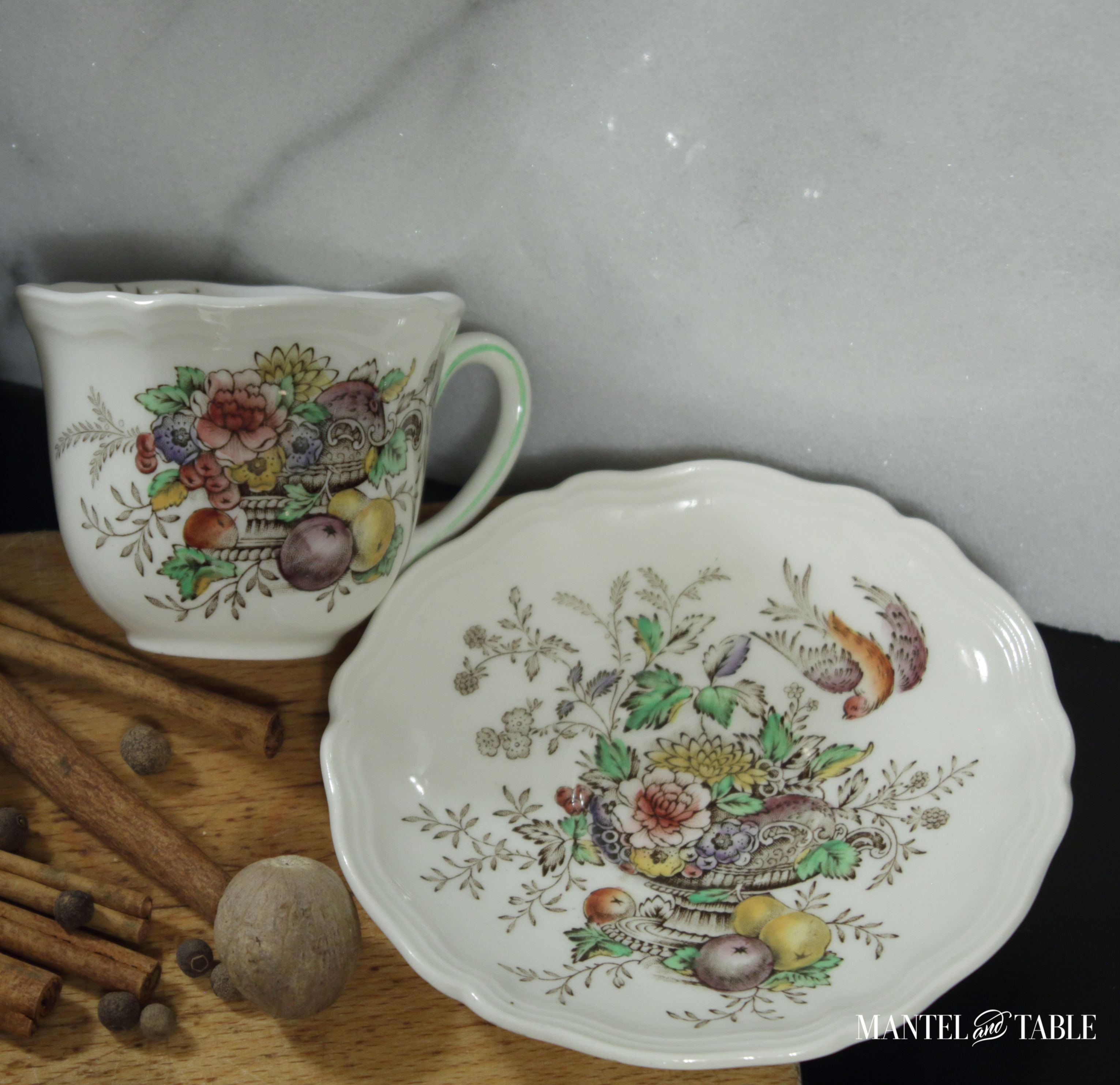 Fall design teacup & saucer on cutting board