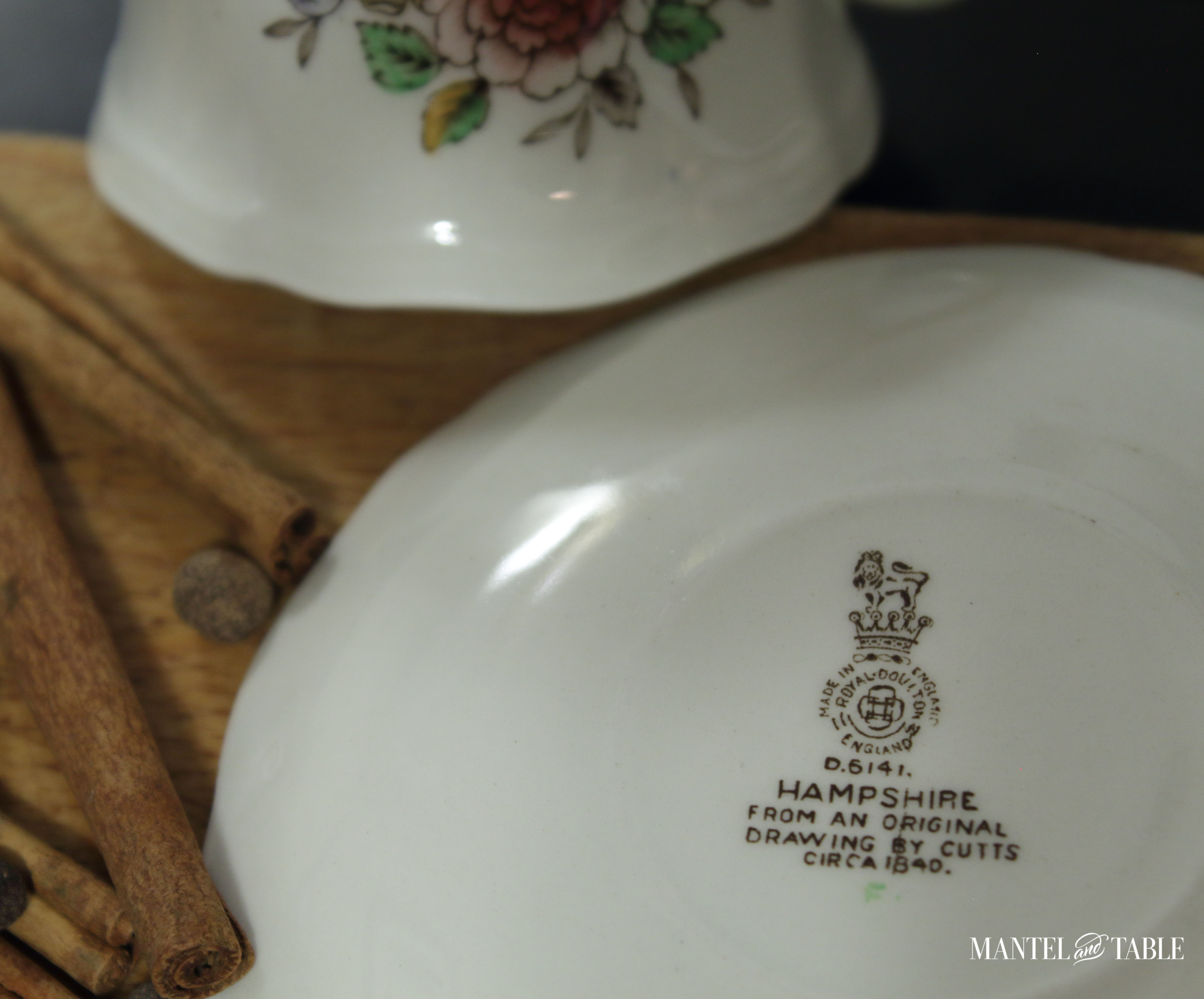 Saucer backstamp with overturned cup showing the pattern