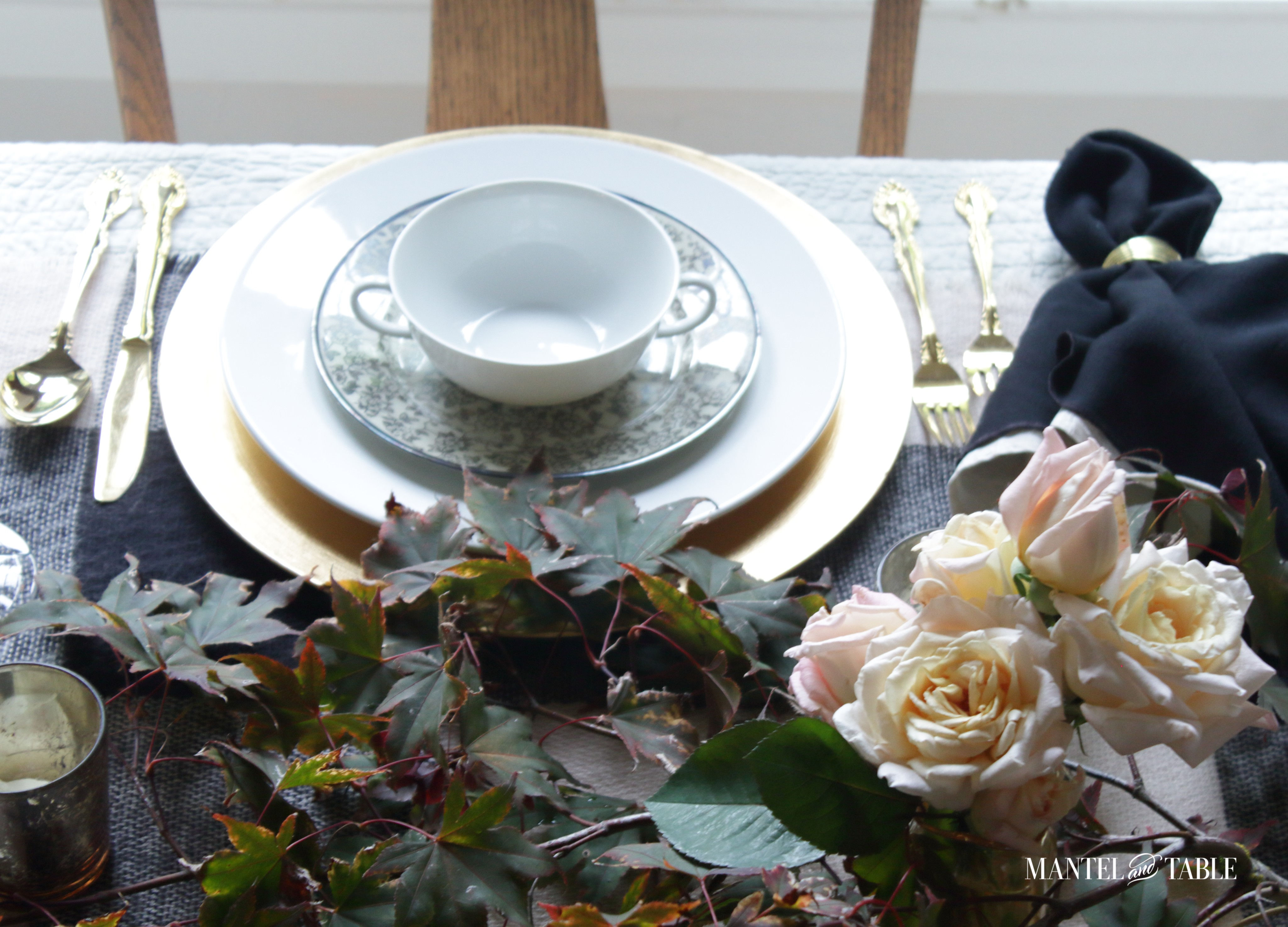Moody Fall Table view of place setting with roses