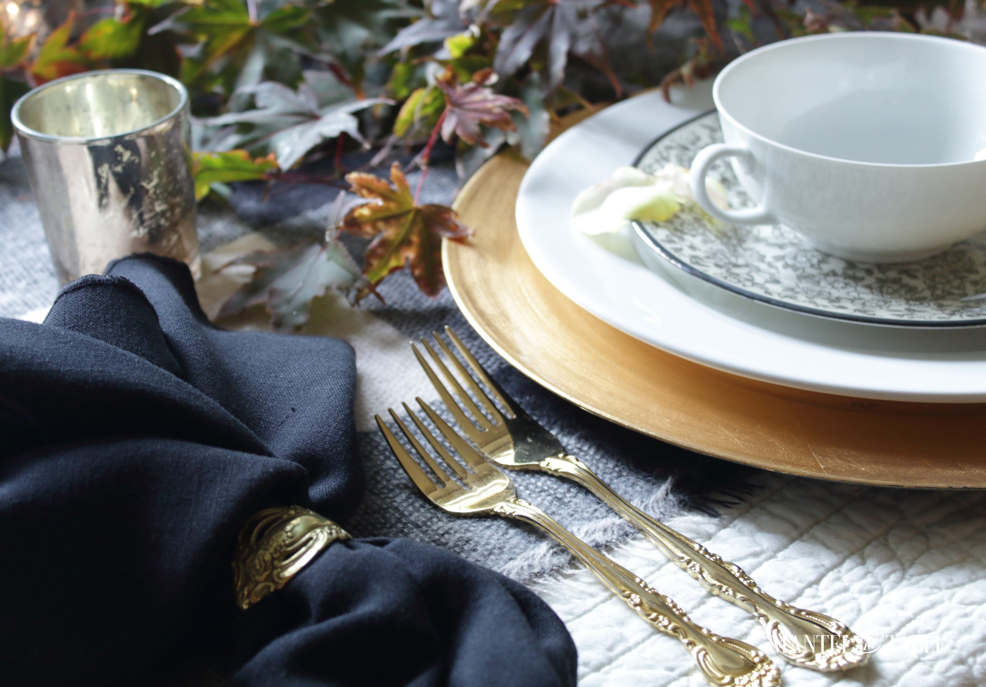 Moody Fall Table view of napkin, flatware, & plate stack
