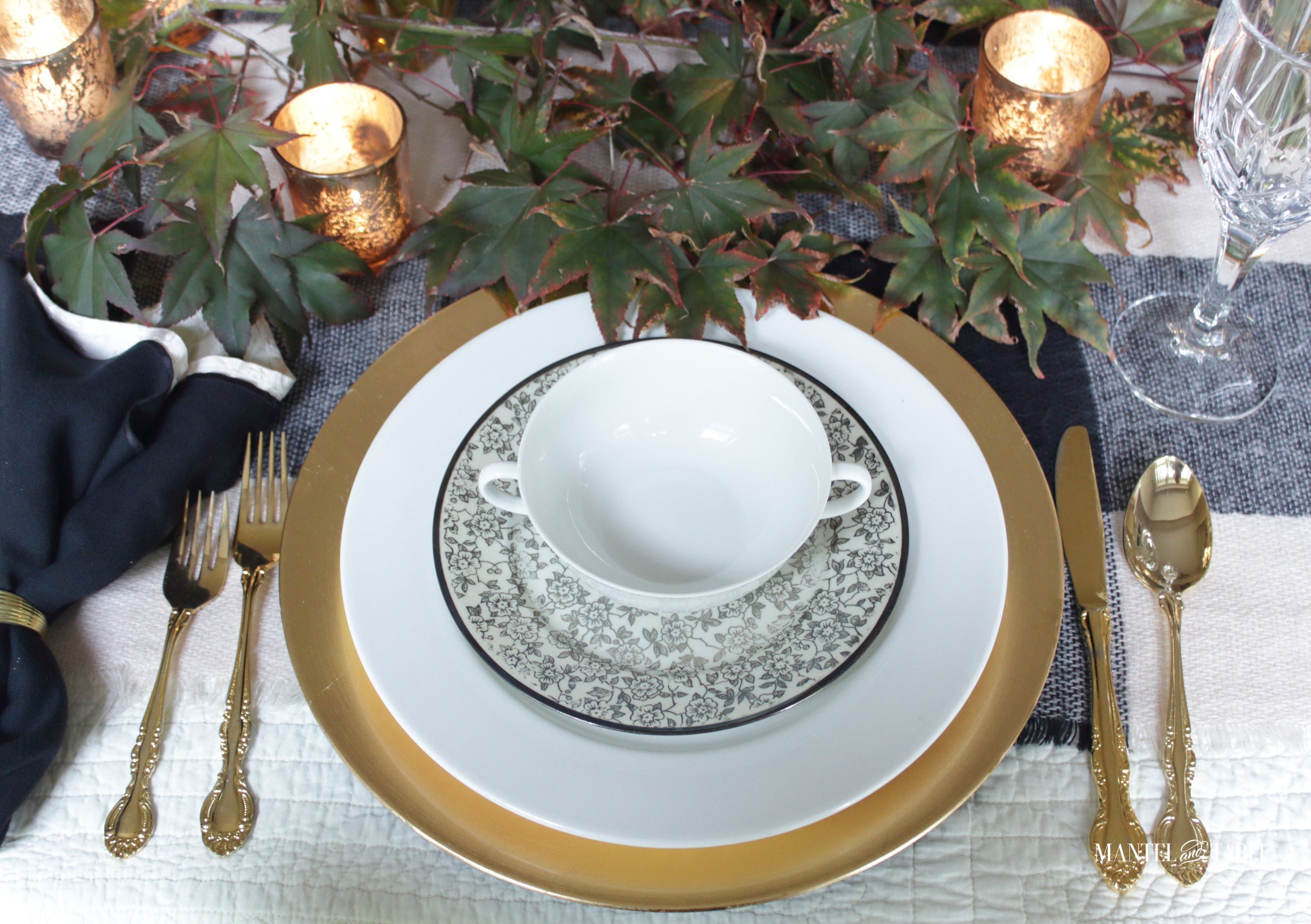 Moody Fall Table view of placesetting with candles