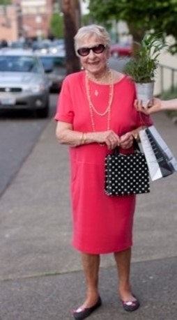 Life Lessons - Mom in her red dress, black polka dot purse, and pearls. Also sunglasses