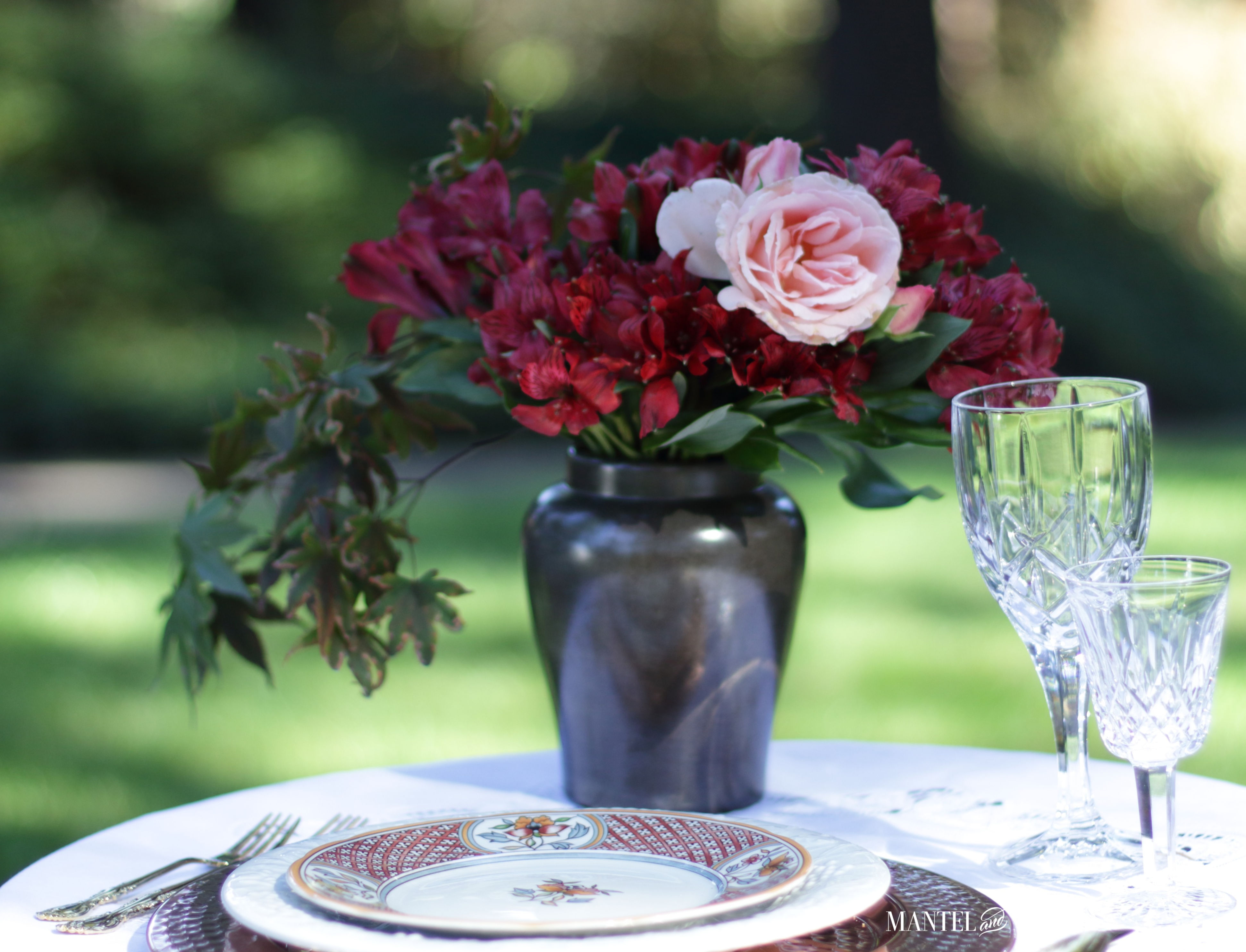 elegant fall picnic flower arrangement and setting