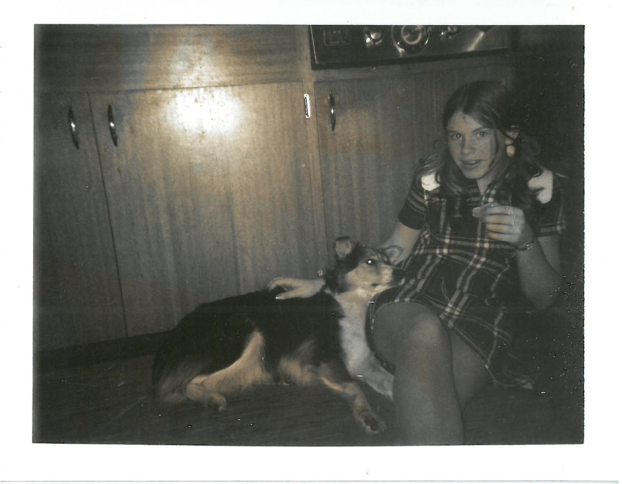 Life Lessons - My dog and me sitting on the floor in the kitchen