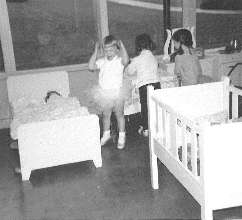Me wearing dress-up tutu and Cinderella heels - 3 years old