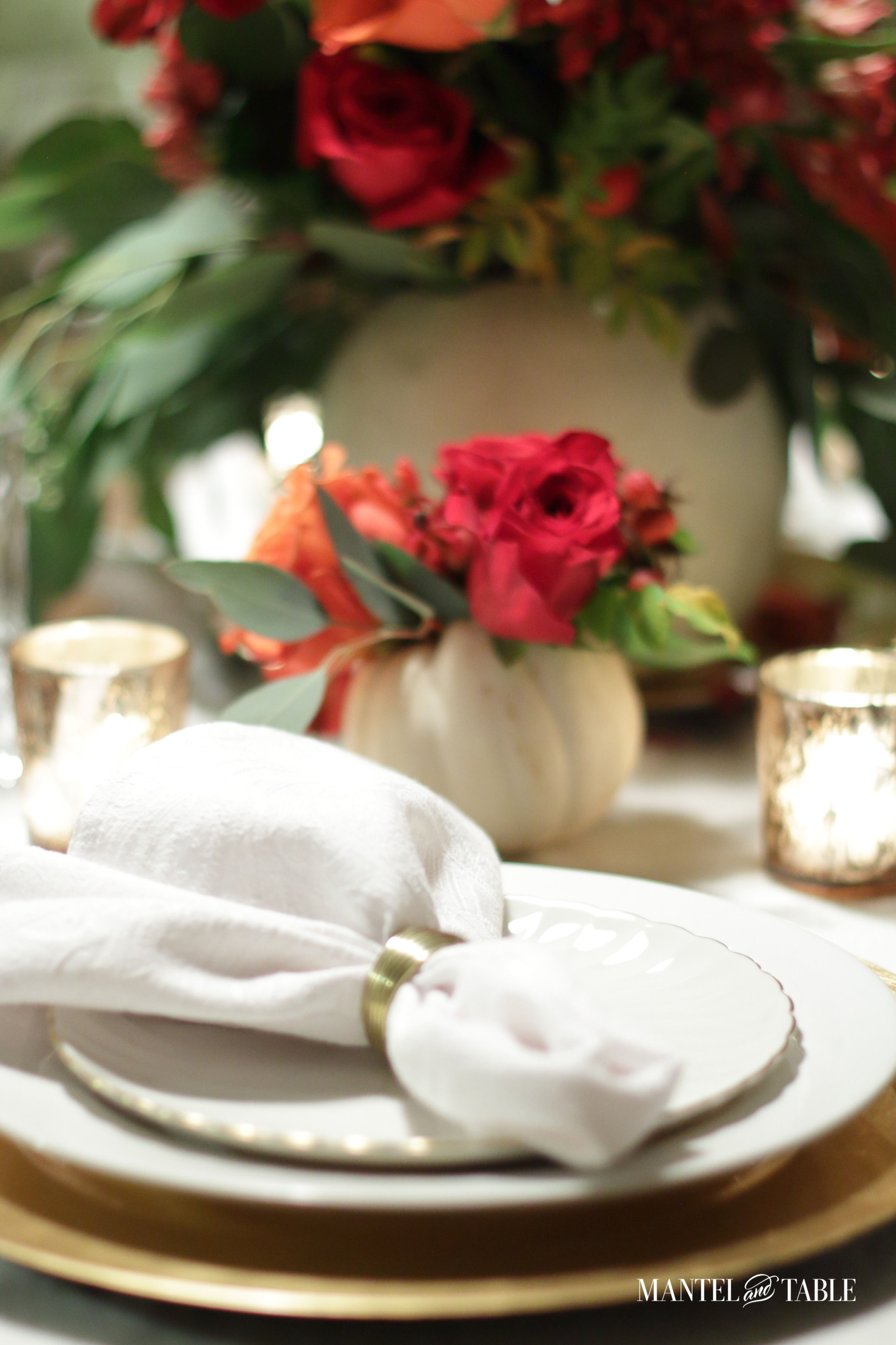 White pumpkin flower arrangement - closeup of place setting