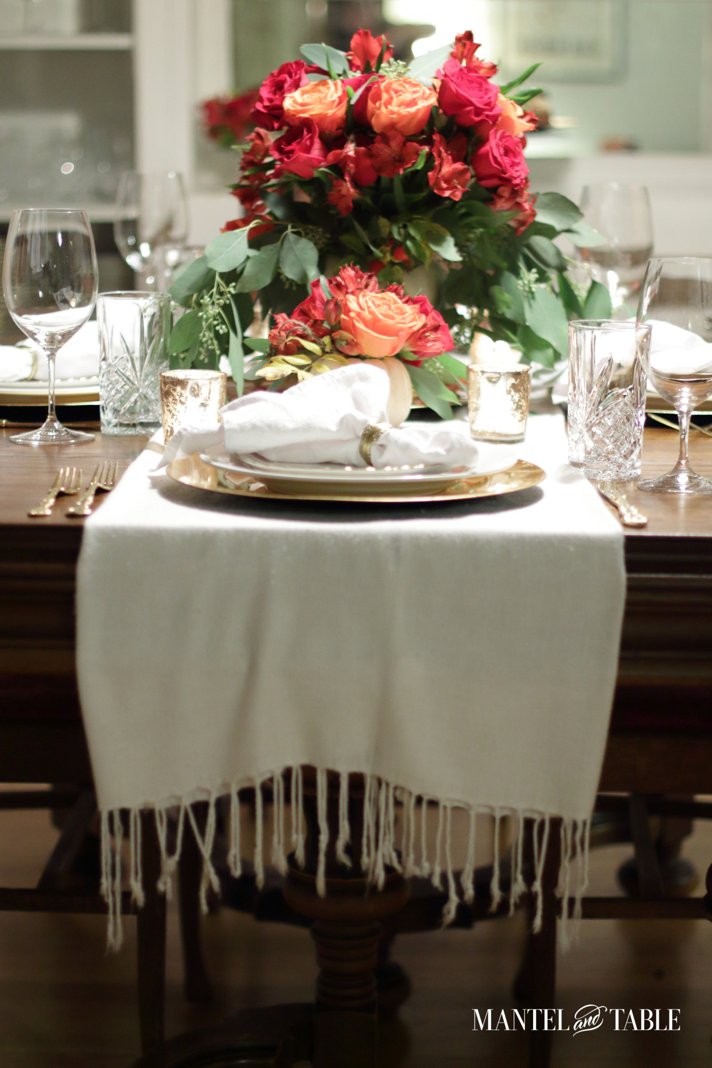 White pumpkin flower arrangement - view from head of table