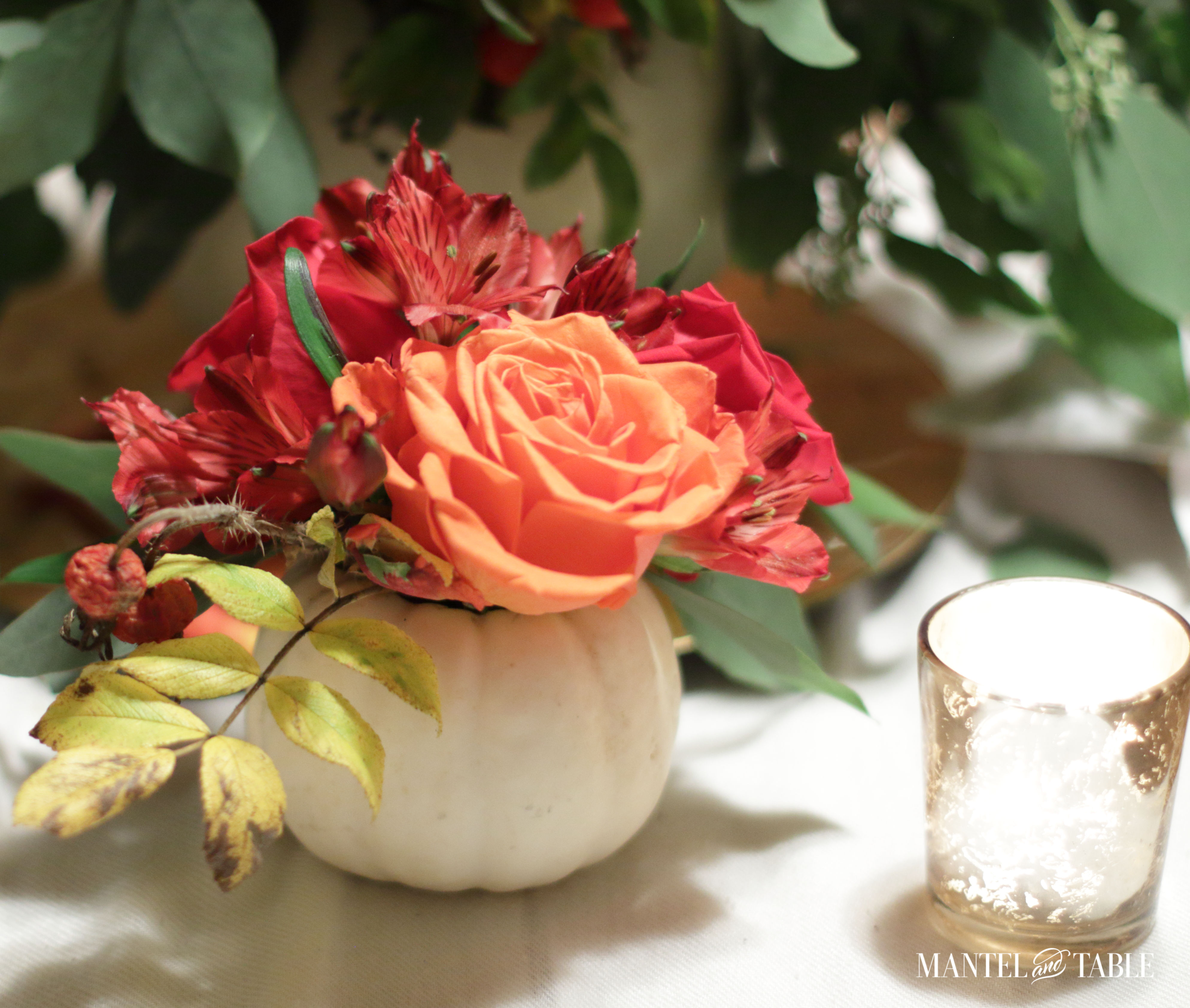 White pumpkin flower arrangement - baby boo on the table