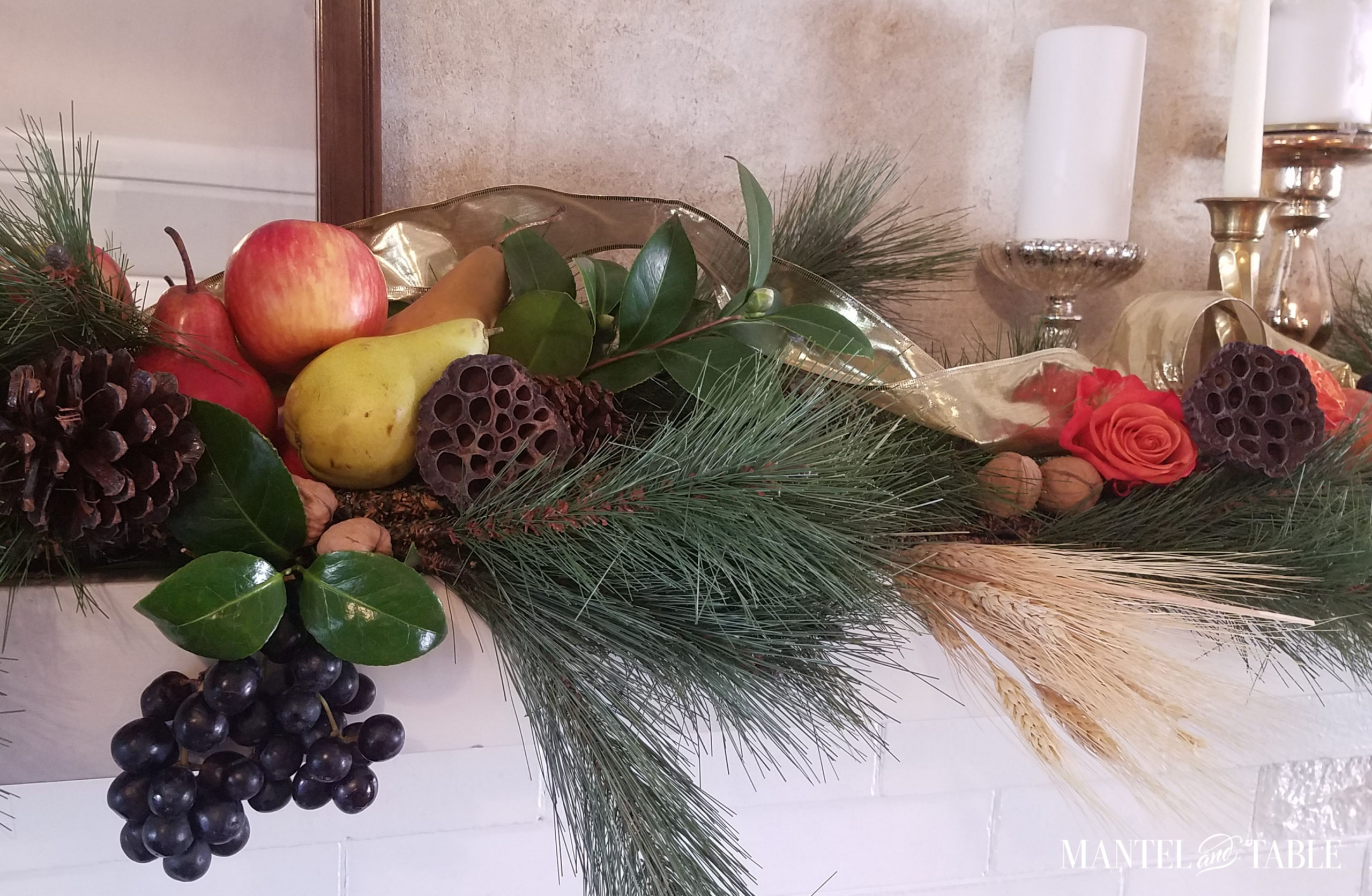 Harvest Mantel closeup of centerpiece apples, pears, walnuts, black grapes