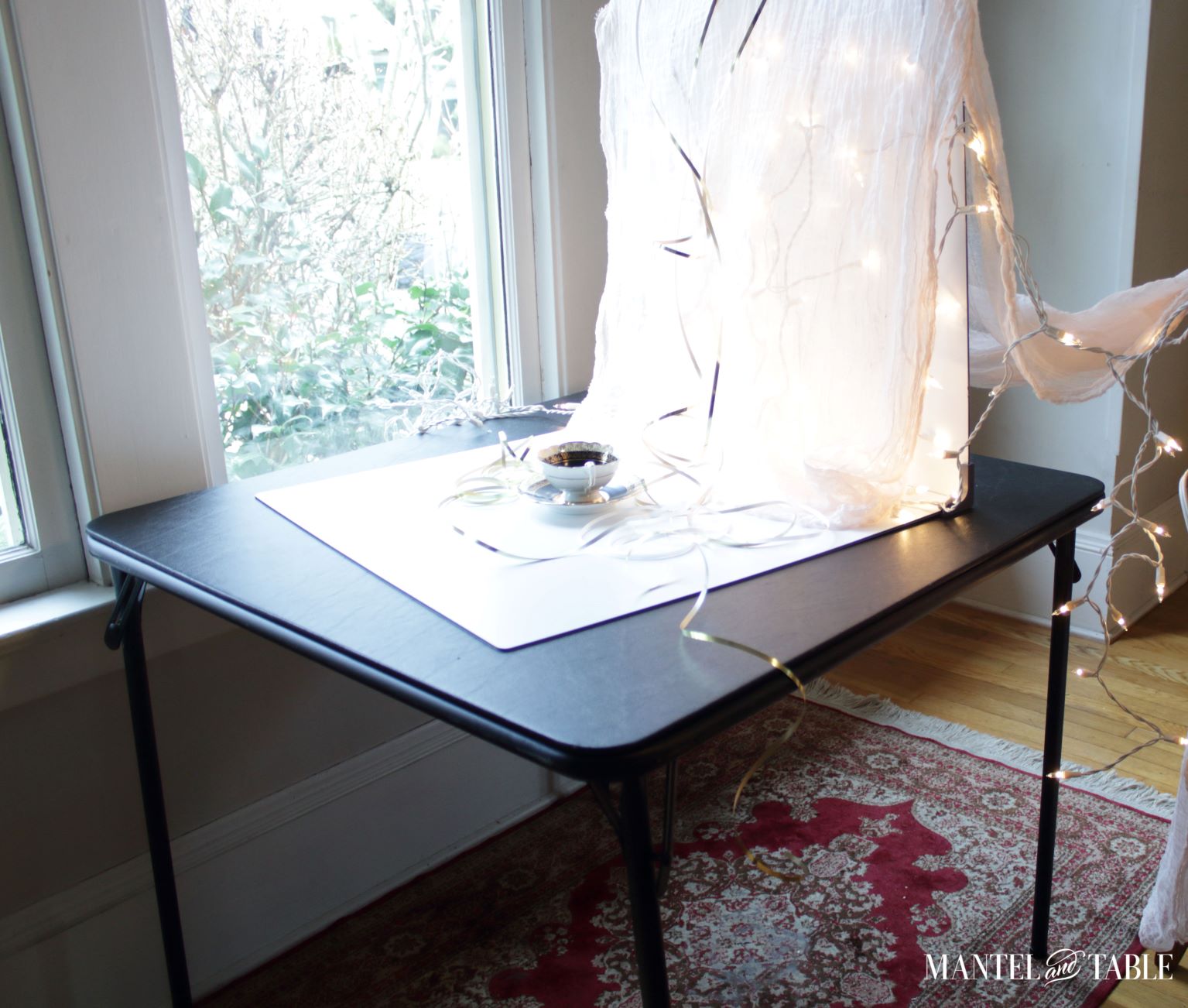 Folding table holding teacup background.