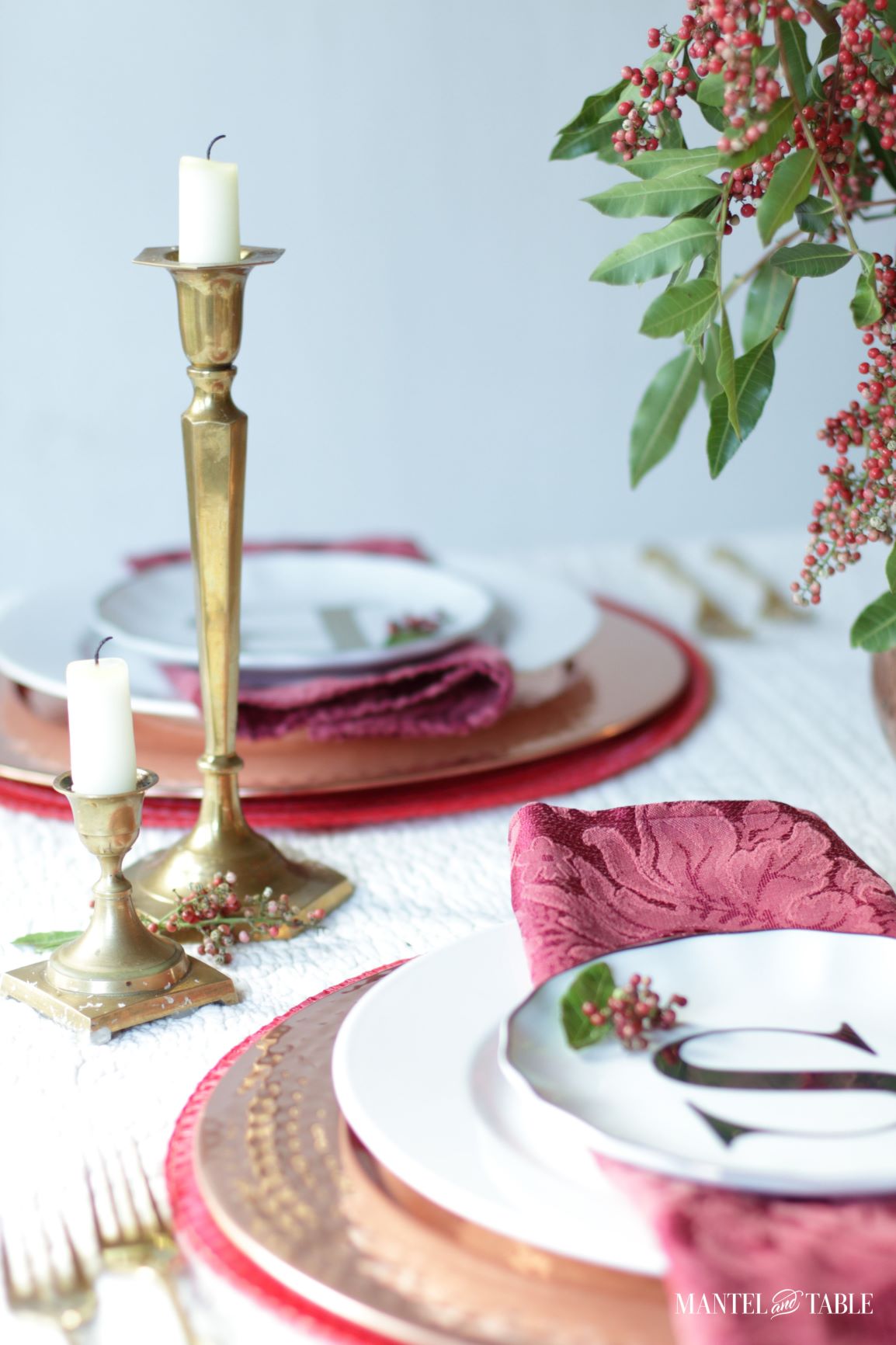 Christmas Tablescape ~ two place settings with closeup of pepperberries in centerpiece