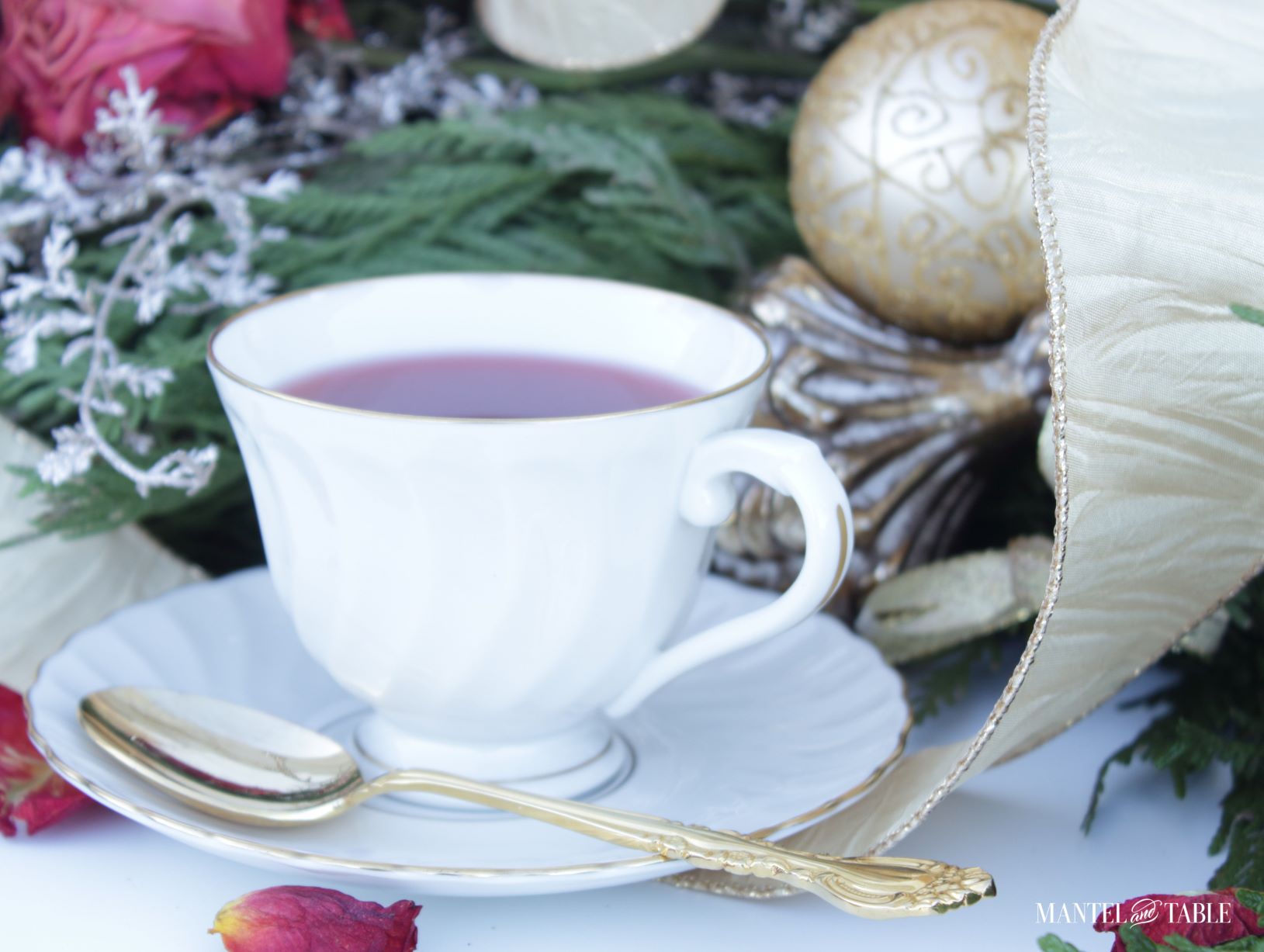 Close up of white and gold teacup