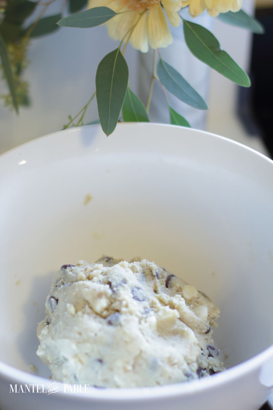 Best Chocolate Chip Cookies ~ Big ball of cookie dough in a white bowl