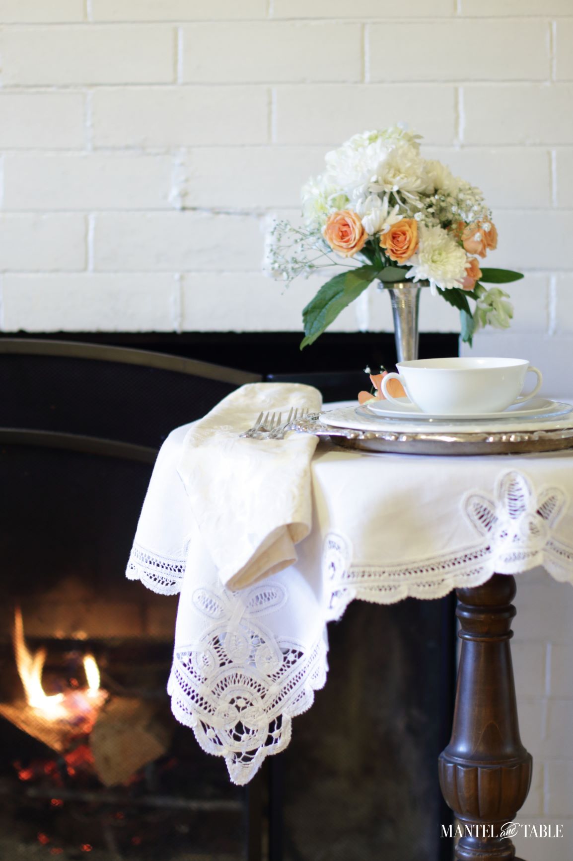 Table Setting for One ~ partial tabletop view with fire