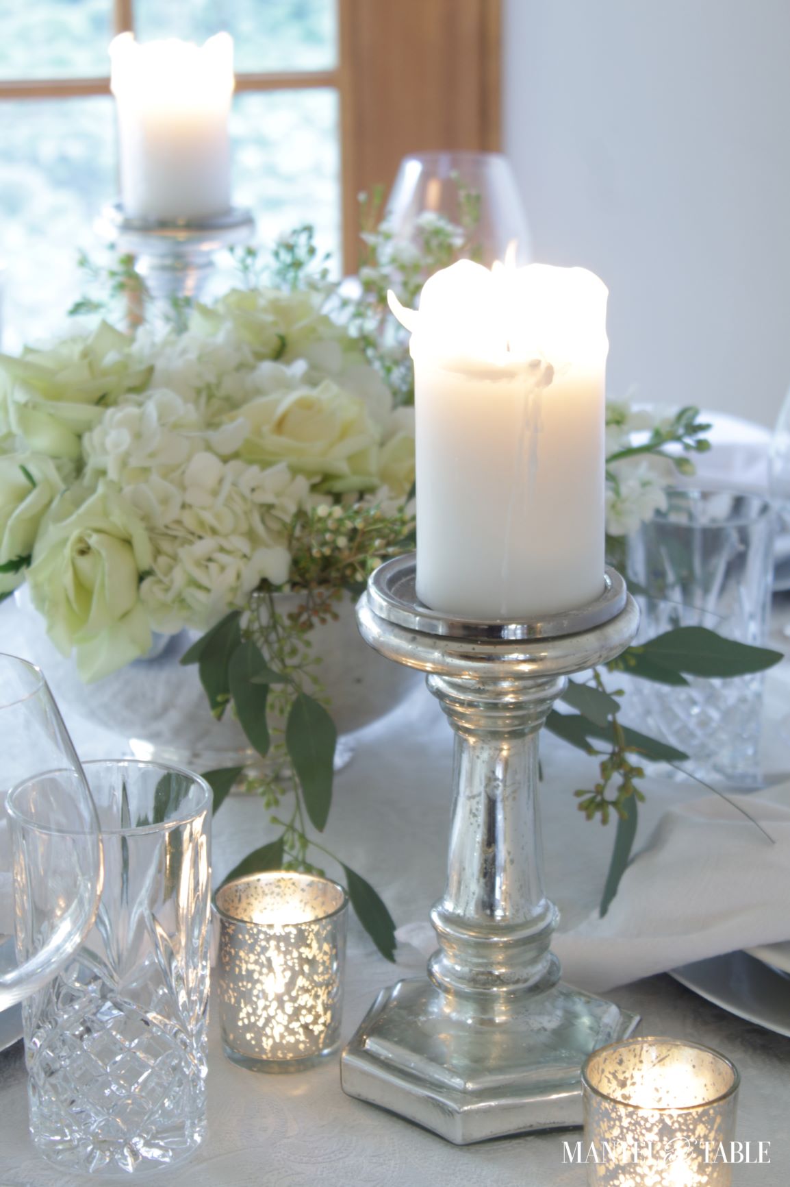 An Elegant St Patrick's Day Table ~ Closeup of glowing candles in silver holders