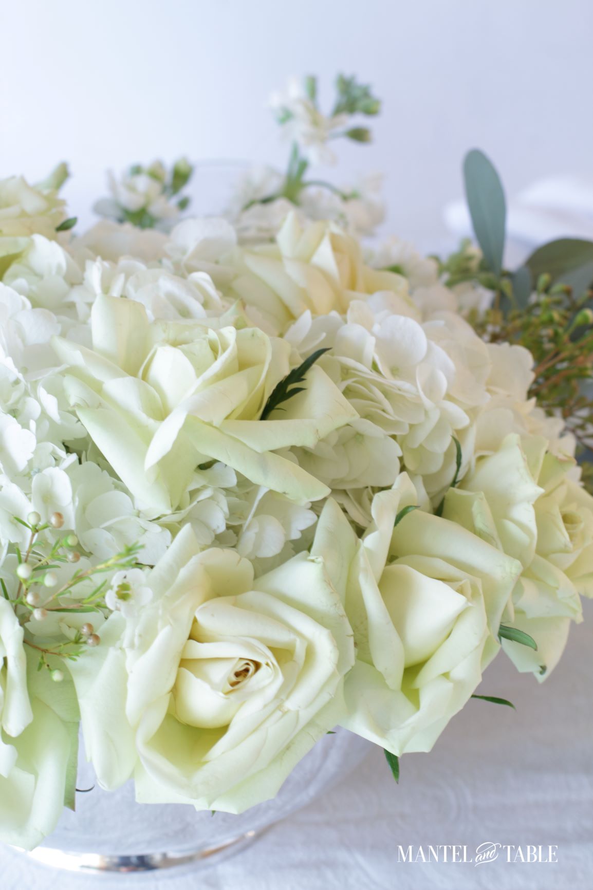 An Elegant St Patrick's Day Table ~ Very close closeup of yellowy green rose arrangement