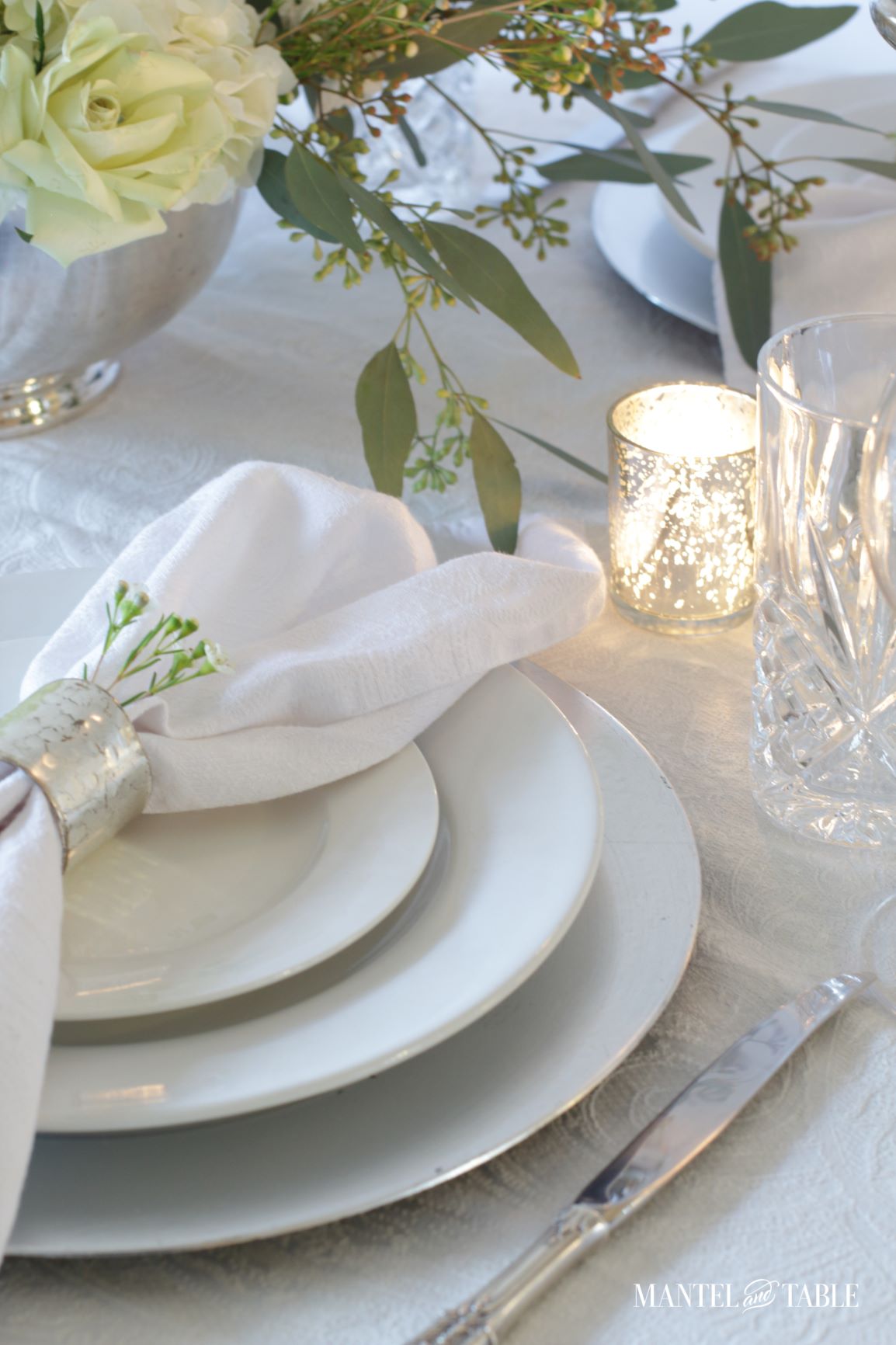 An Elegant St Patrick's Day Table ~ Closeup of white plate stack on white table
