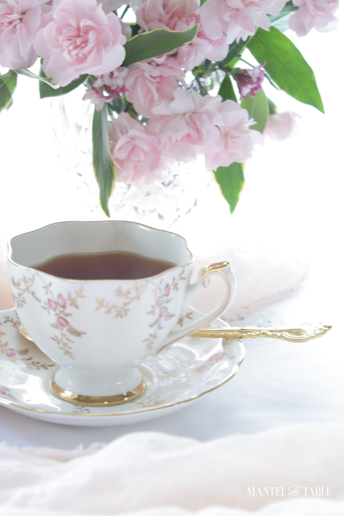 Pink & Gold Teacup full of tea
