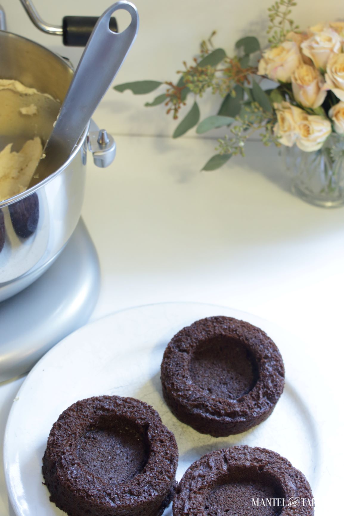 3 tiny chocolate cake layers on a plate